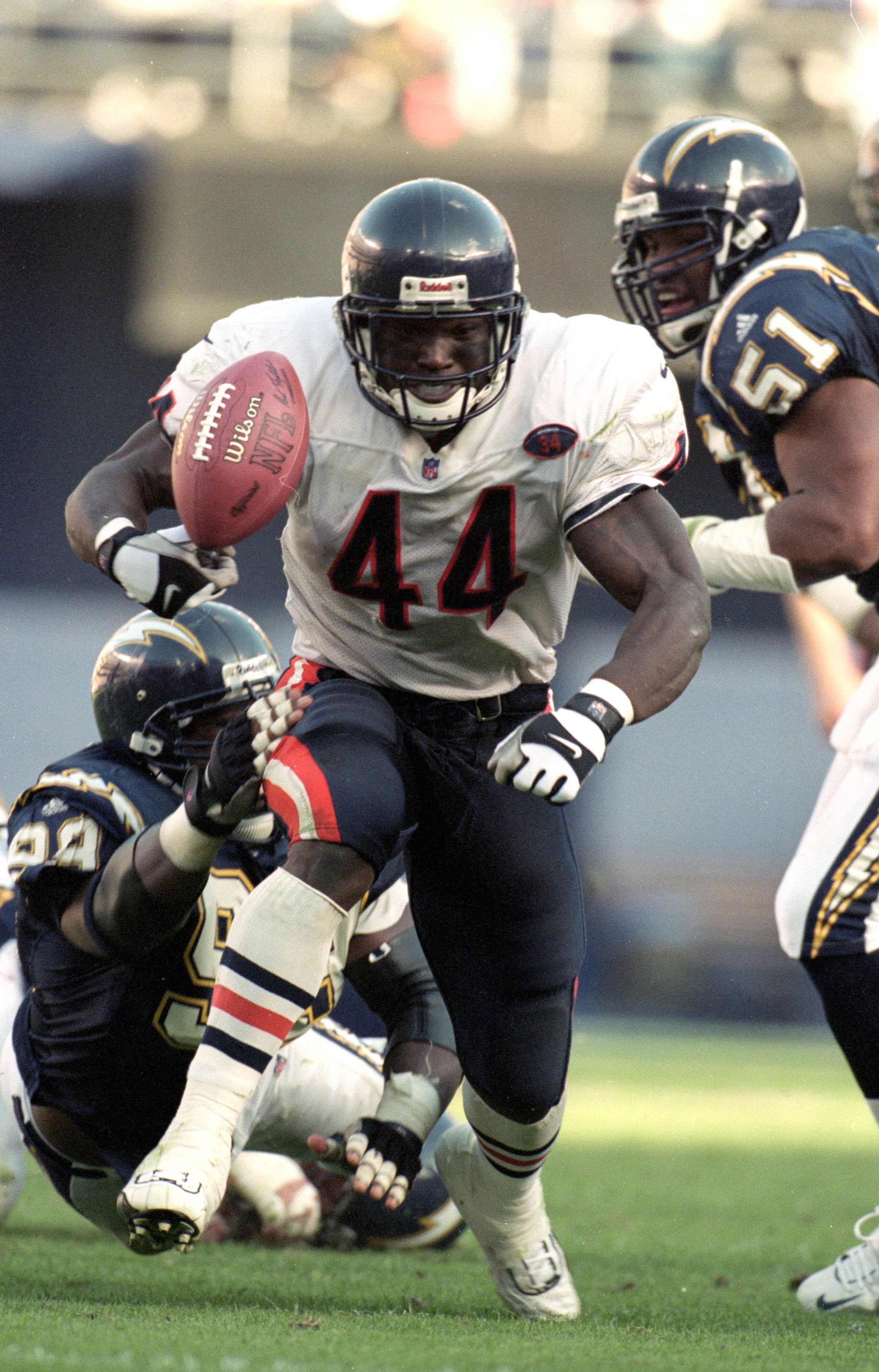 21 Nov 1999: Curtis Enis #44 of the Chicago Bears fumbles the ball during a game against the San Diego Chargers at the Qualcomm Stadium in San Diego, California. The Bears defeated the Chargers 23-20.