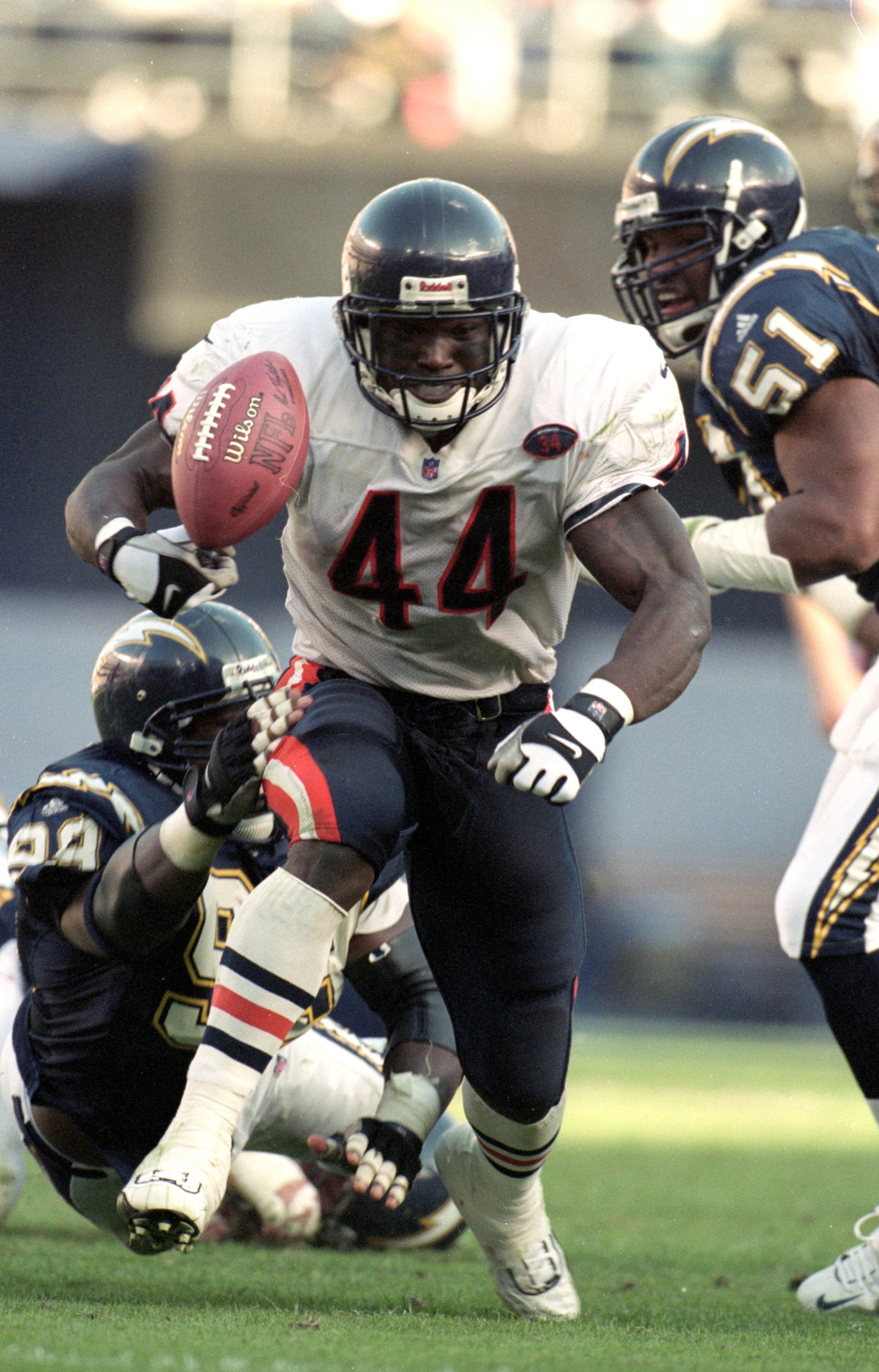21 Nov 1999: Curtis Enis #44 of the Chicago Bears fumbles the ball during a game against the San Diego Chargers at the Qualcomm Stadium in San Diego, California. The Bears defeated the Chargers 23-20. 21 Nov 1999: Curtis Enis #44 of the Chicago Bears fumbles the ball during a game against the San Diego Chargers at the Qualcomm Stadium in San Diego, California. The Bears defeated the Chargers 23-20.