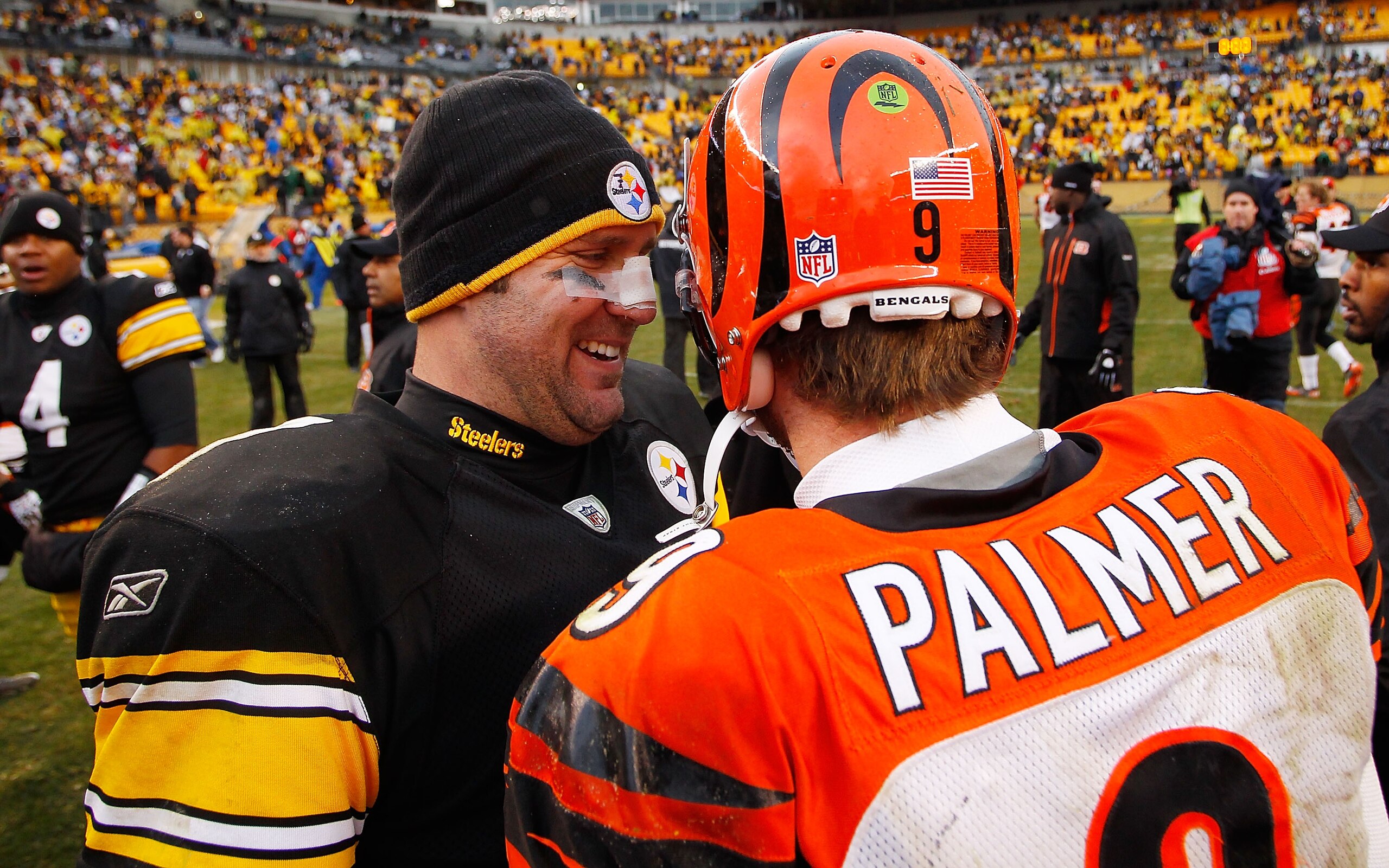 PITTSBURGH - DECEMBER 12:  Ben Roethlisberger #7 of the Pittsburgh Steelers laughs with Carson Palmer #9 of the Cincinnati Bengals following the game on December 12, 2010 at Heinz Field in Pittsburgh, Pennsylvania.  (Photo by Jared Wickerham/Getty Images)