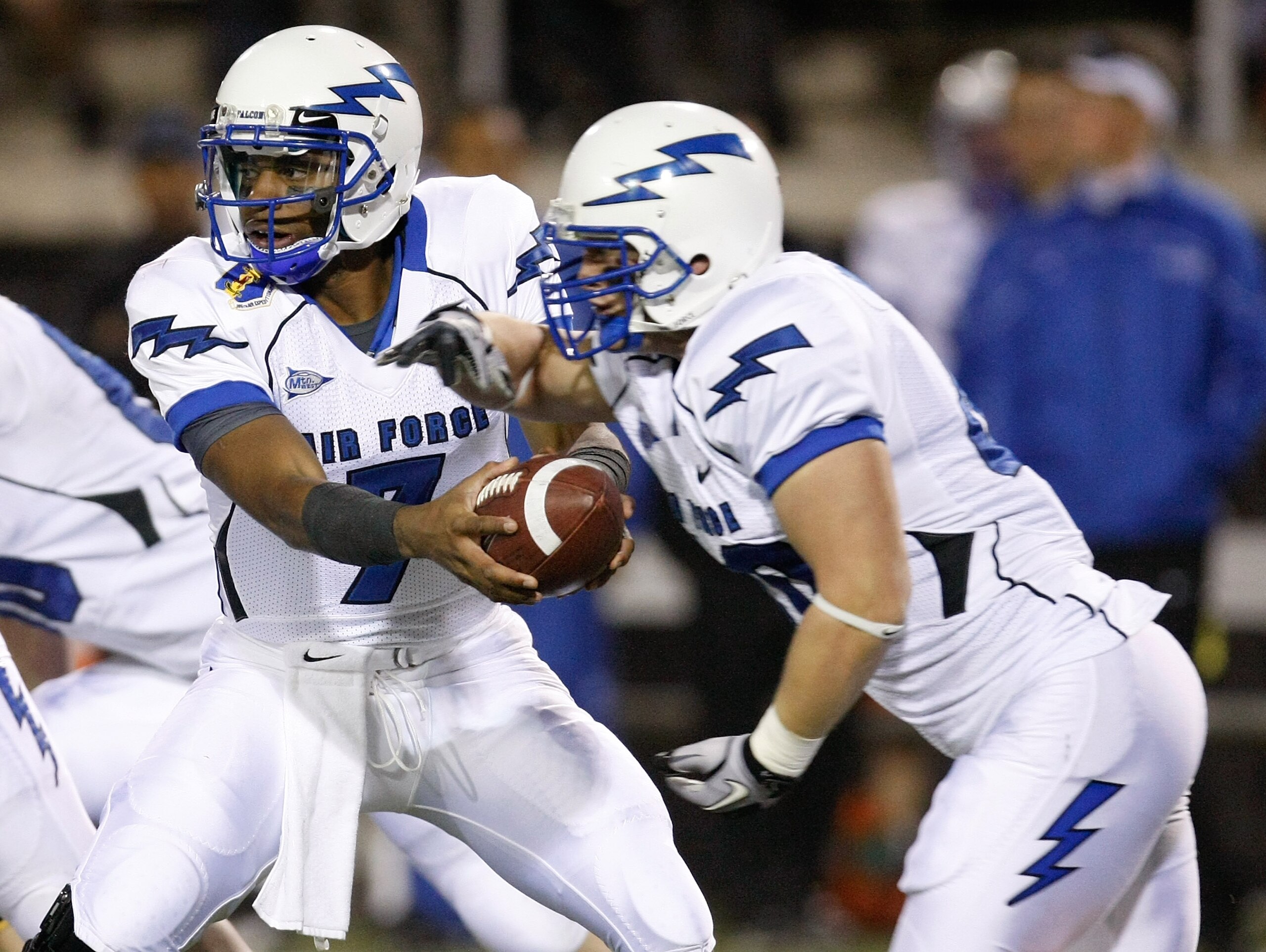 LAS VEGAS - NOVEMBER 18: Quarterback Tim Jefferson Jr. #7 of the Air Force Falcons hands the ball off to Ryan Southworth #40 during a game against the UNLV Rebels at Sam Boyd Stadium November 18, 2010 in Las Vegas, Nevada. Air Force won 35-20. (Photo by LAS VEGAS - NOVEMBER 18: Quarterback Tim Jefferson Jr. #7 of the Air Force Falcons hands the ball off to Ryan Southworth #40 during a game against the UNLV Rebels at Sam Boyd Stadium November 18, 2010 in Las Vegas, Nevada. Air Force won 35-20. (Photo by