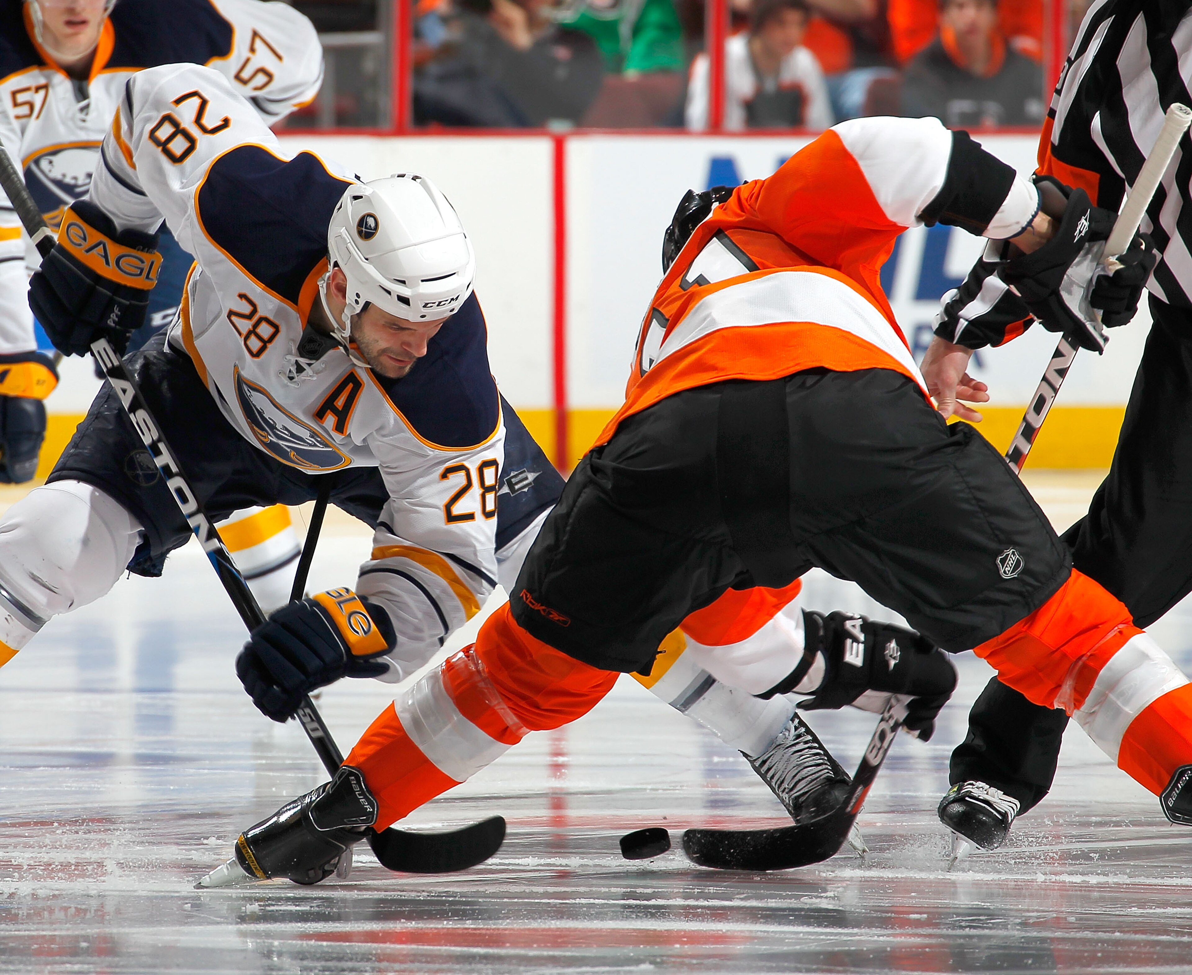PHILADELPHIA, PA - APRIL 16:  Paul Gaustad #28 of the Buffalo Sabres faces off with Blair Betts #11 of the Philadelphia Flyers in Game Two of the Eastern Conference Quarterfinals during the 2011 NHL Stanley Cup Playoffs at Wells Fargo Center on April 16,