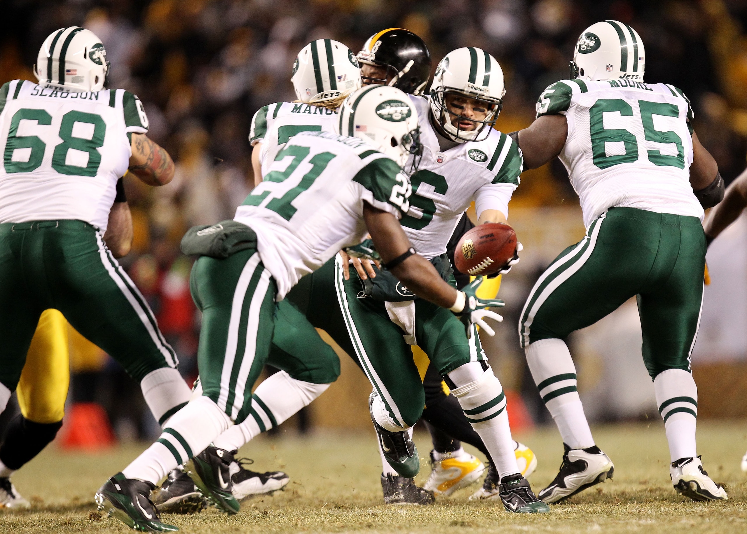 PITTSBURGH, PA - JANUARY 23:  Mark Sanchez #6 of the New York Jets drops back during their 19 to 24 loss to the Pittsburgh Steelers in the 2011 AFC Championship game at Heinz Field on January 23, 2011 in Pittsburgh, Pennsylvania.  (Photo by Ronald Martine