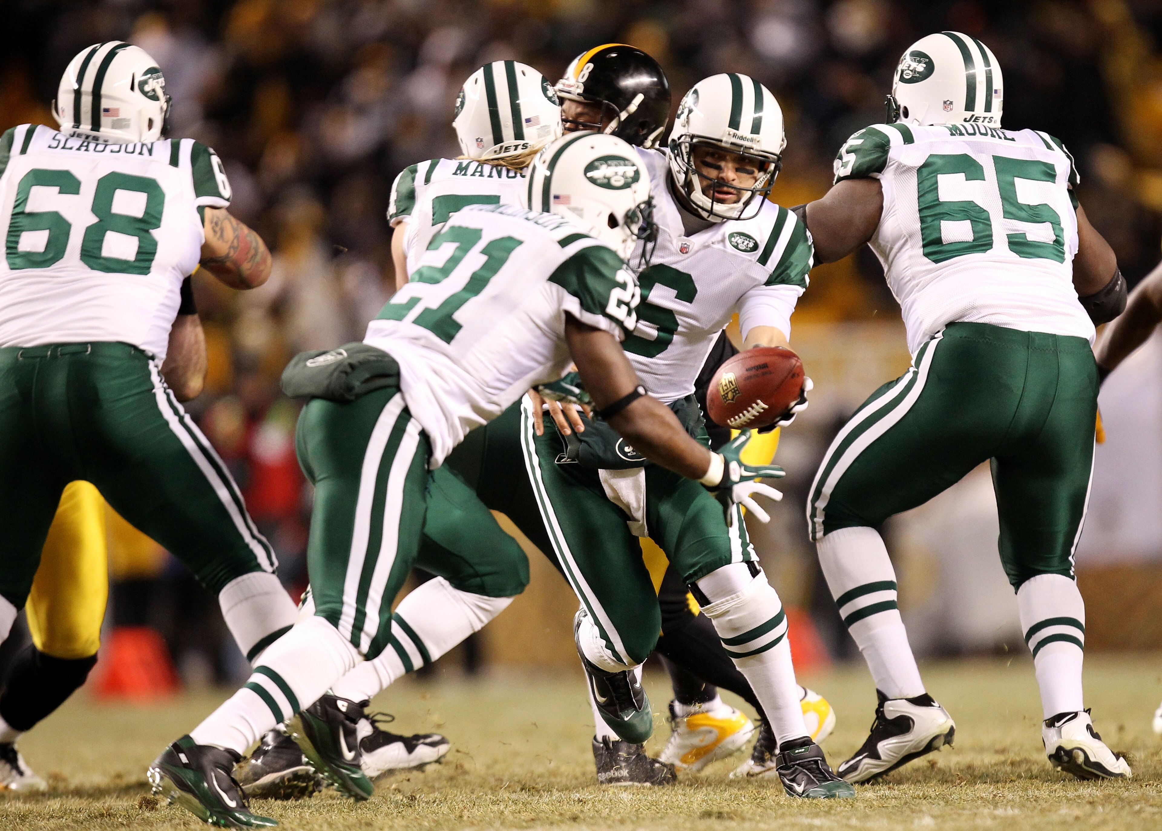 PITTSBURGH, PA - JANUARY 23:  Mark Sanchez #6 of the New York Jets drops back during their 19 to 24 loss to the Pittsburgh Steelers in the 2011 AFC Championship game at Heinz Field on January 23, 2011 in Pittsburgh, Pennsylvania.  (Photo by Ronald Martine