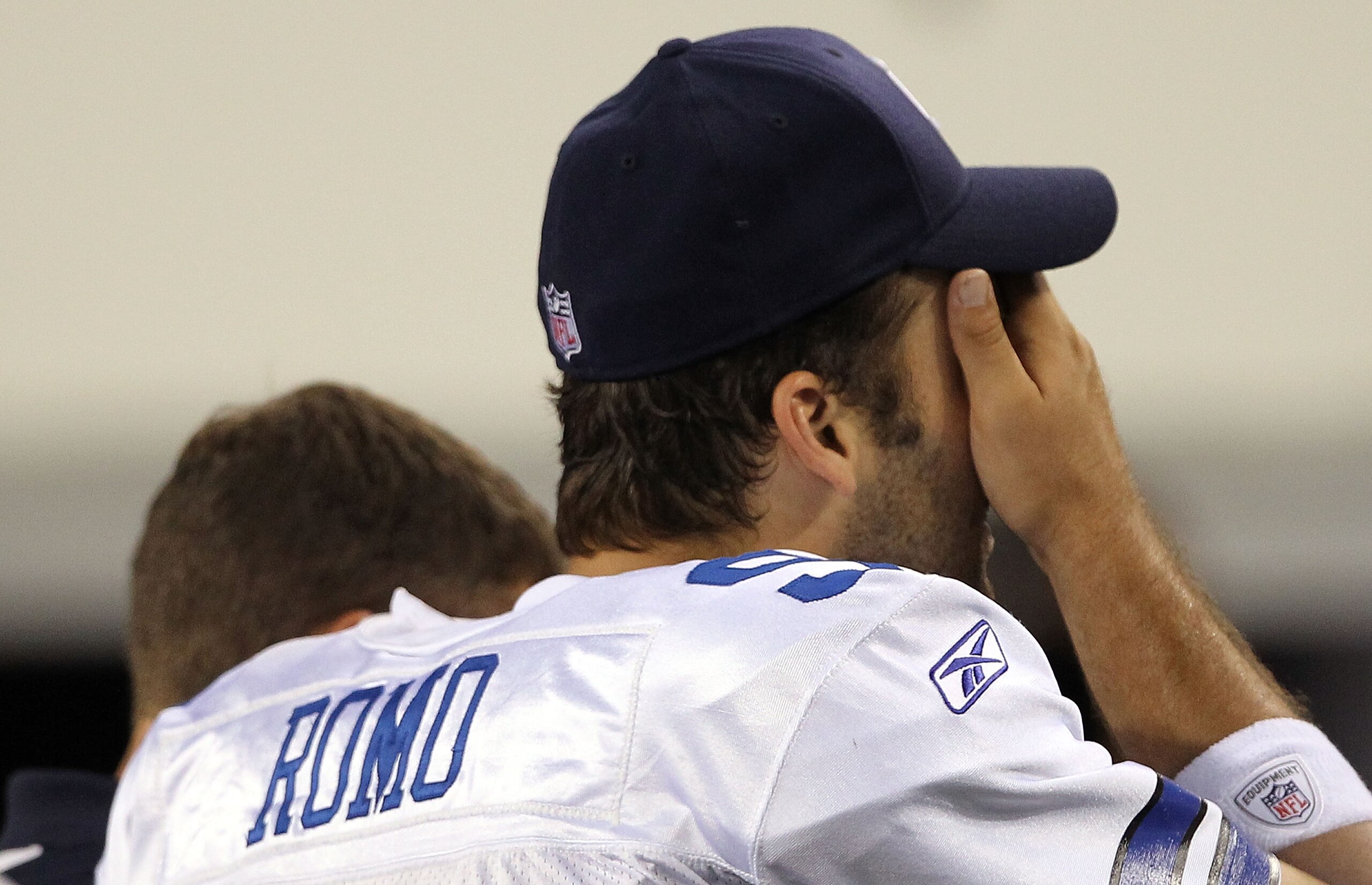 ARLINGTON, TX - OCTOBER 25: Quarterback Tony Romo #9 of the Dallas Cowboys leaves the game after a left shoulder injury in the second quarter against the New York Giants at Cowboys Stadium on October 25, 2010 in Arlington, Texas. (Photo by Ronald Martin ARLINGTON, TX - OCTOBER 25: Quarterback Tony Romo #9 of the Dallas Cowboys leaves the game after a left shoulder injury in the second quarter against the New York Giants at Cowboys Stadium on October 25, 2010 in Arlington, Texas. (Photo by Ronald Martin
