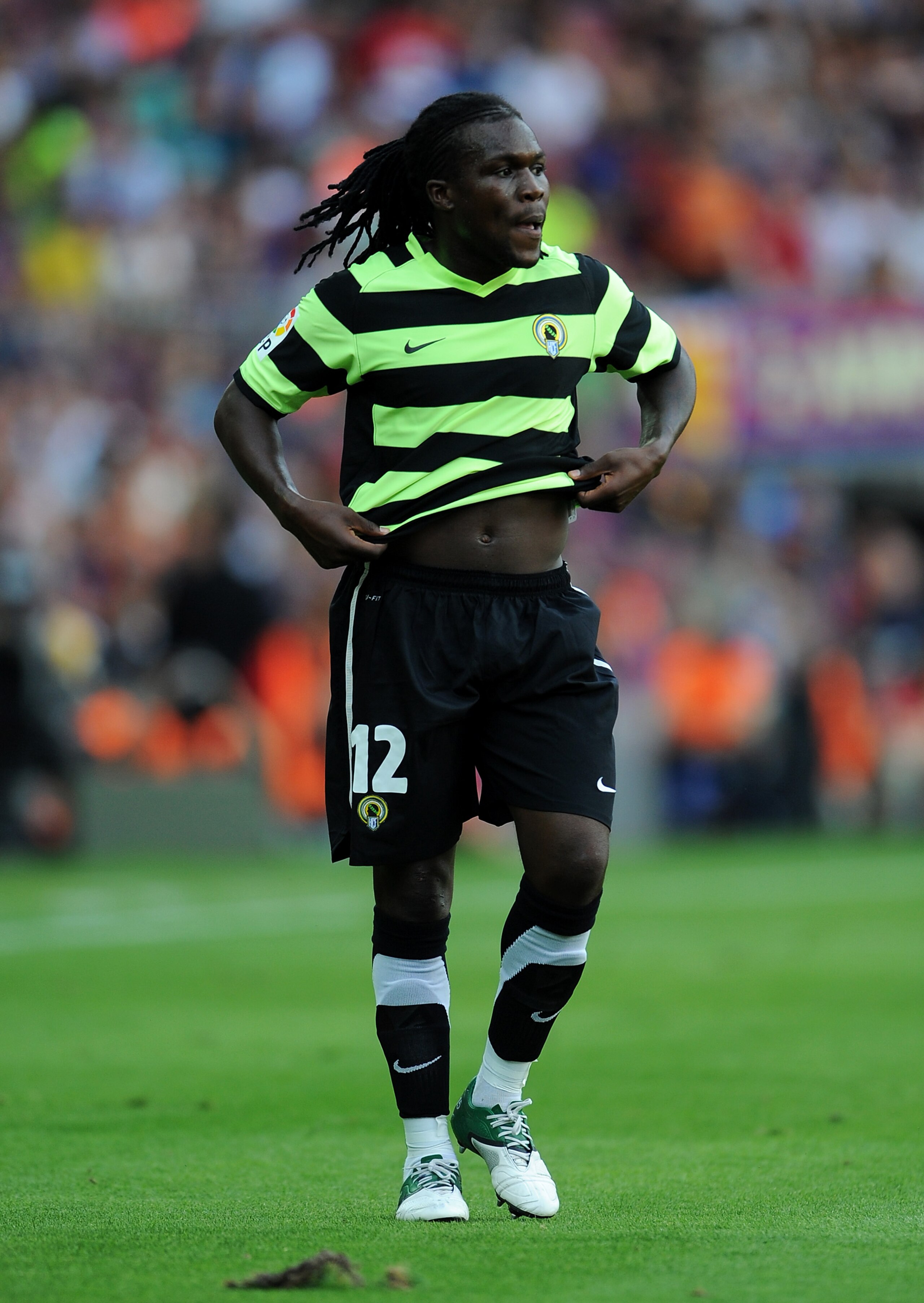 BARCELONA, SPAIN - SEPTEMBER 11:  Royston Drenthe of Hercules watches on during the La Liga match between Barcelona and Hercules at the Camp Nou stadium on September 11, 2010 in Barcelona, Spain. Barcelona lost the match 2-0.  (Photo by Jasper Juinen/Gett