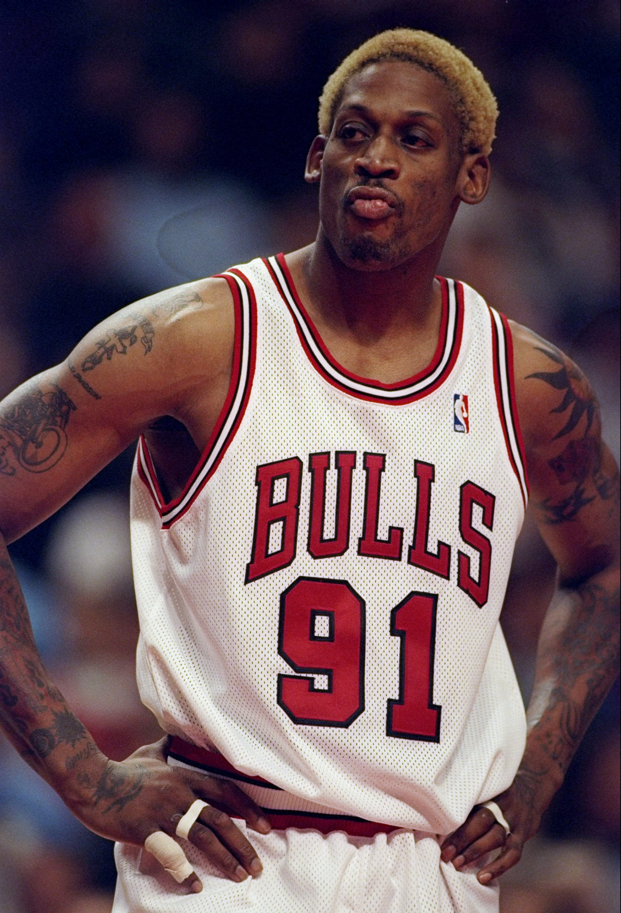 14 Nov 1997:  Forward Dennis Rodman of the Chicago Bulls stands on the court during a game against the Charlotte Hornets at the United Center in Chicago, Illinois.  The Bulls won the game 105-92. Mandatory Credit: Jonathan Daniel  /Allsport