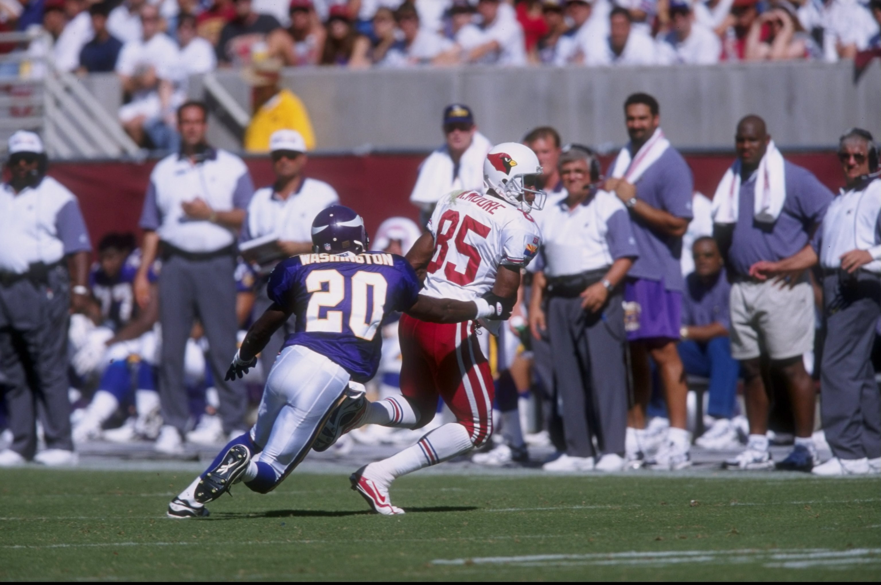 5 Oct 1997:  Rob Moore #85 of the Arizona Cardinals is pursued by Dewayne Washington #20 of the Minnesota Vikings during a game at the Sun Devil Stadium in Tempe, Arizona. The Vikings defeated the Cardinals 20-19. Mandatory Credit: Stephen Dunn  /Allsport