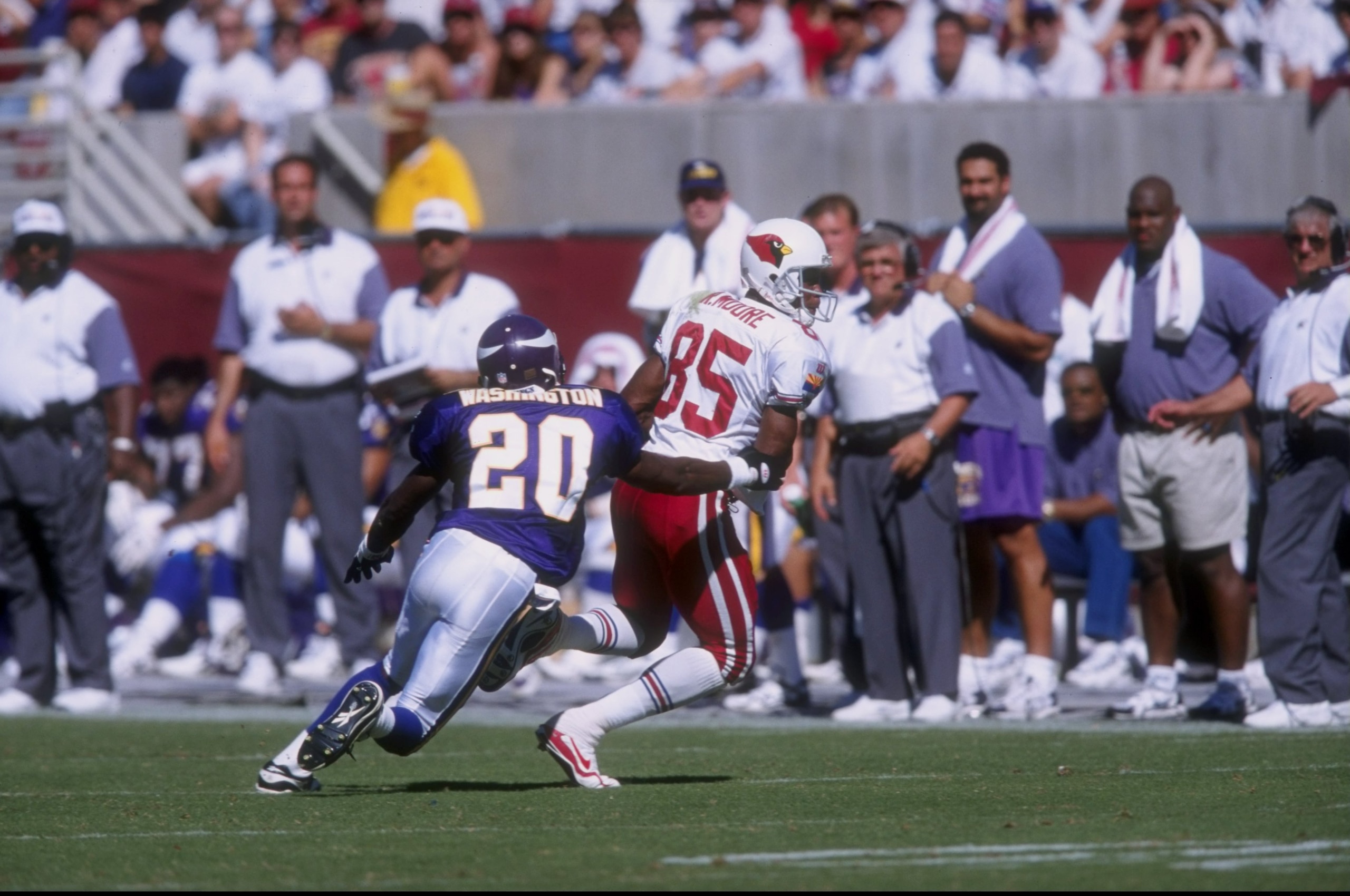 5 Oct 1997: Rob Moore #85 of the Arizona Cardinals is pursued by Dewayne Washington #20 of the Minnesota Vikings during a game at the Sun Devil Stadium in Tempe, Arizona. The Vikings defeated the Cardinals 20-19. Mandatory Credit: Stephen Dunn /Allsport 5 Oct 1997: Rob Moore #85 of the Arizona Cardinals is pursued by Dewayne Washington #20 of the Minnesota Vikings during a game at the Sun Devil Stadium in Tempe, Arizona. The Vikings defeated the Cardinals 20-19. Mandatory Credit: Stephen Dunn /Allsport