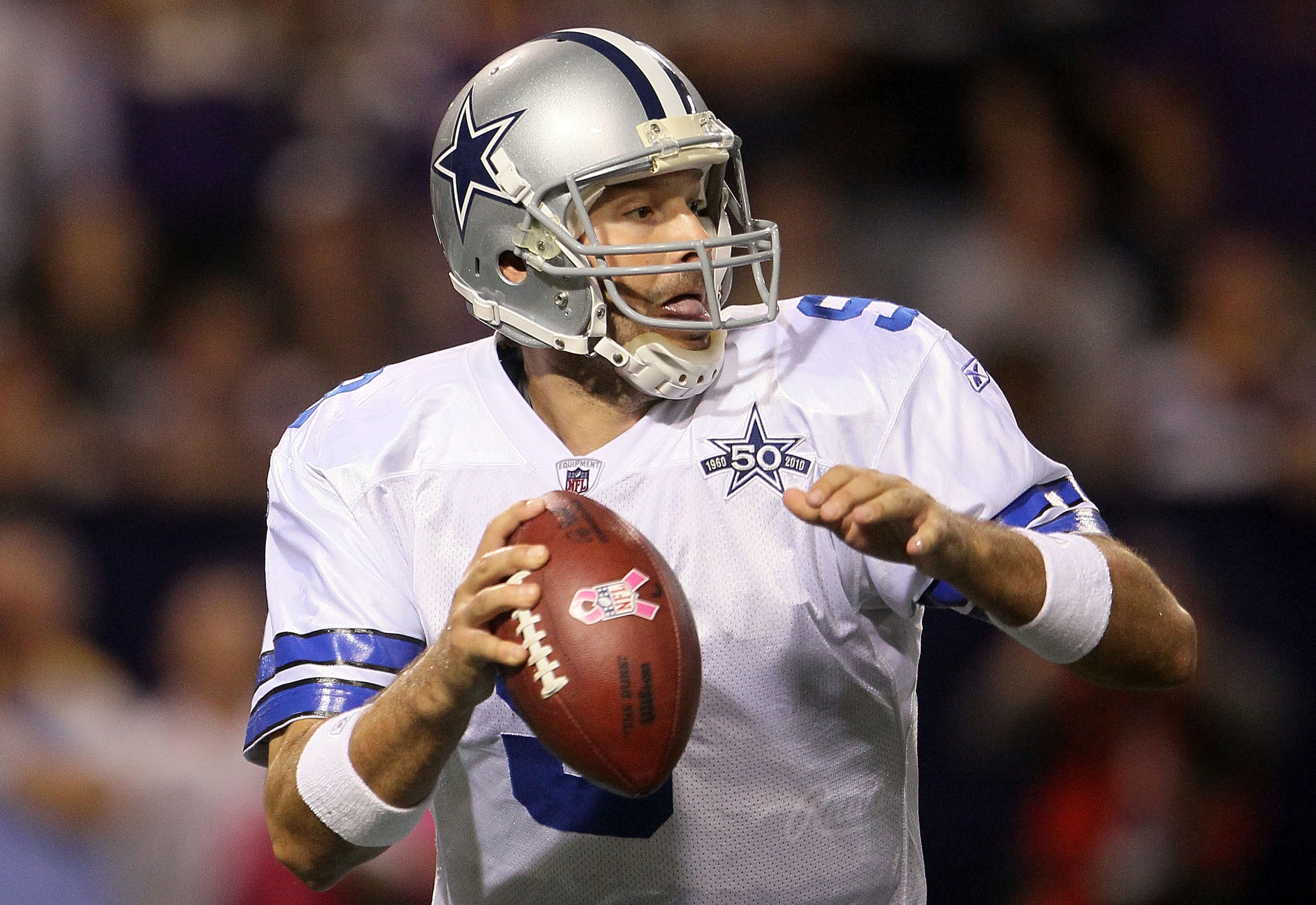 MINNEAPOLIS - OCTOBER 17:  Quarterback Tony Romo #9 of the Dallas Cowboys drops back to pass against the Minnesota Vikings at Mall of America Field on October 17, 2010 in Minneapolis, Minnesota.  (Photo by Jeff Gross/Getty Images)