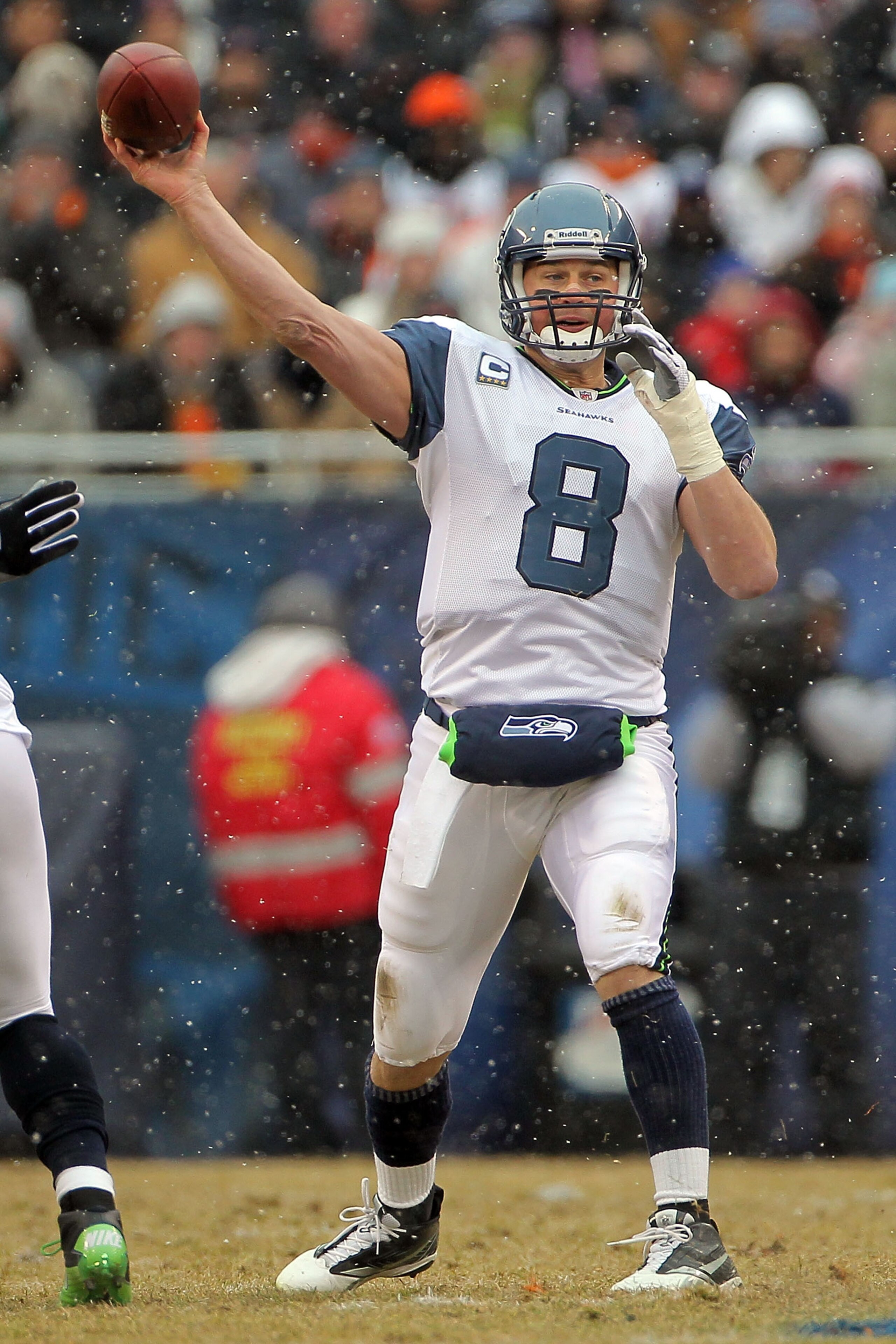 CHICAGO, IL - JANUARY 16:  Quarterback Matt Hasselbeck #8 of the Seattle Seahawks throws the ball in the first half against the Chicago Bears in the 2011 NFC divisional playoff game at Soldier Field on January 16, 2011 in Chicago, Illinois.  (Photo by Dou