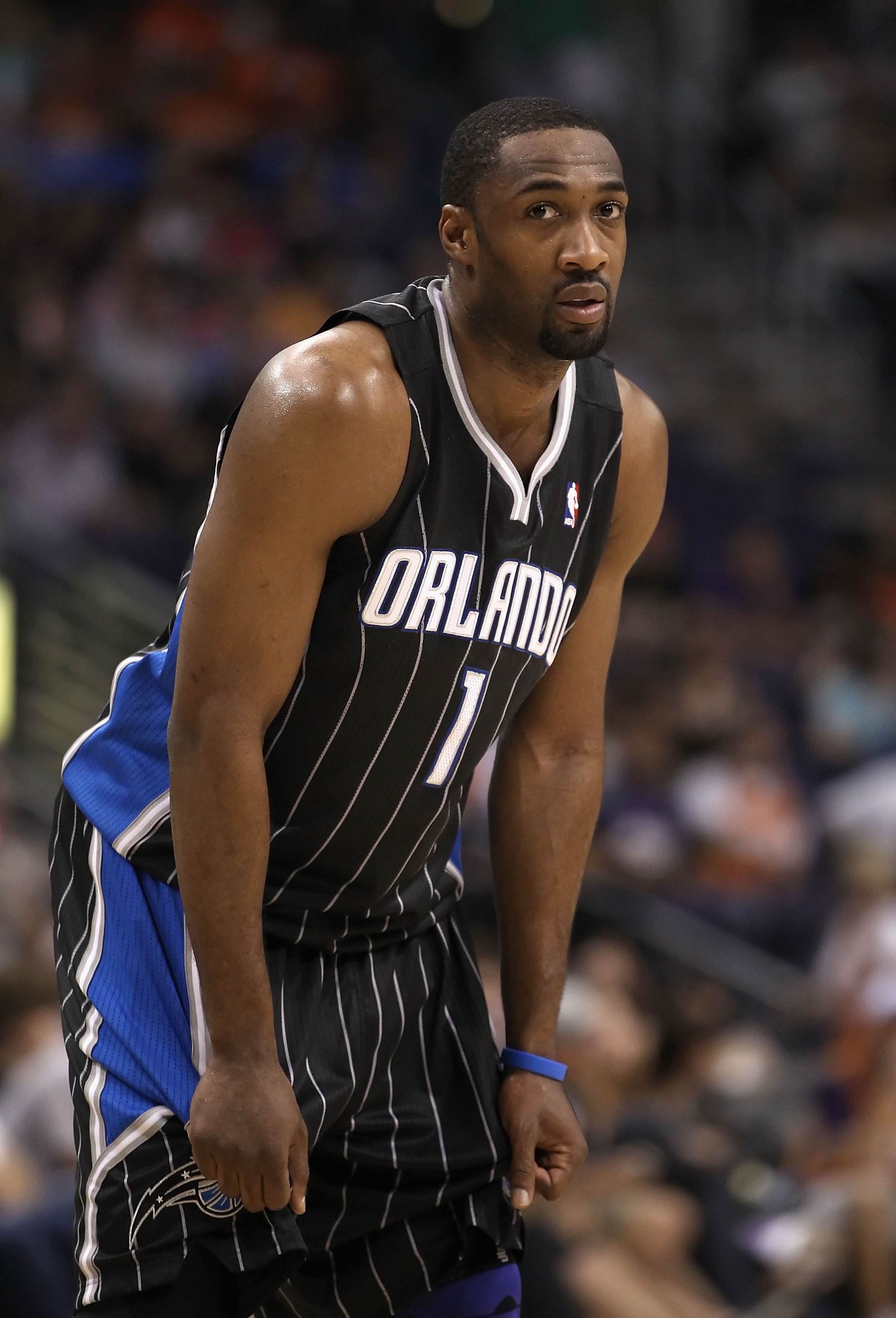 PHOENIX, AZ - MARCH 13: Gilbert Arenas #1 of the Orlando Magic during the NBA game against the Phoenix Suns at US Airways Center on March 13, 2011 in Phoenix, Arizona. NOTE TO USER: User expressly acknowledges and agrees that, by downloading and or usin PHOENIX, AZ - MARCH 13: Gilbert Arenas #1 of the Orlando Magic during the NBA game against the Phoenix Suns at US Airways Center on March 13, 2011 in Phoenix, Arizona. NOTE TO USER: User expressly acknowledges and agrees that, by downloading and or usin