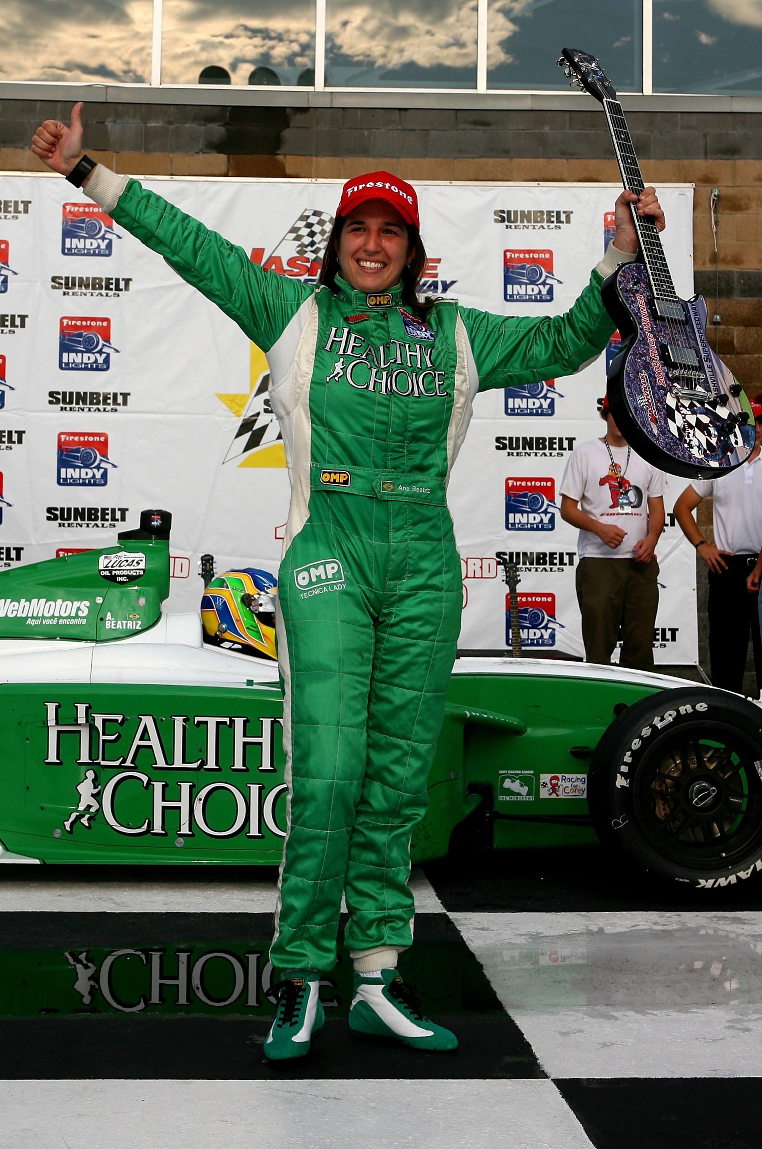 NASHVILLE, TN - JULY 12: Ana Beatriz of Brazil, driver of the #20 Sam Schmidt Motorsports Dallara Indy Light celebrates winning the Firestone Indy Lights Subelt Rentals 100 on July 12, 2008 at the Nashville SuperSpeedway in Nashville, Tennessee.  (Photo b