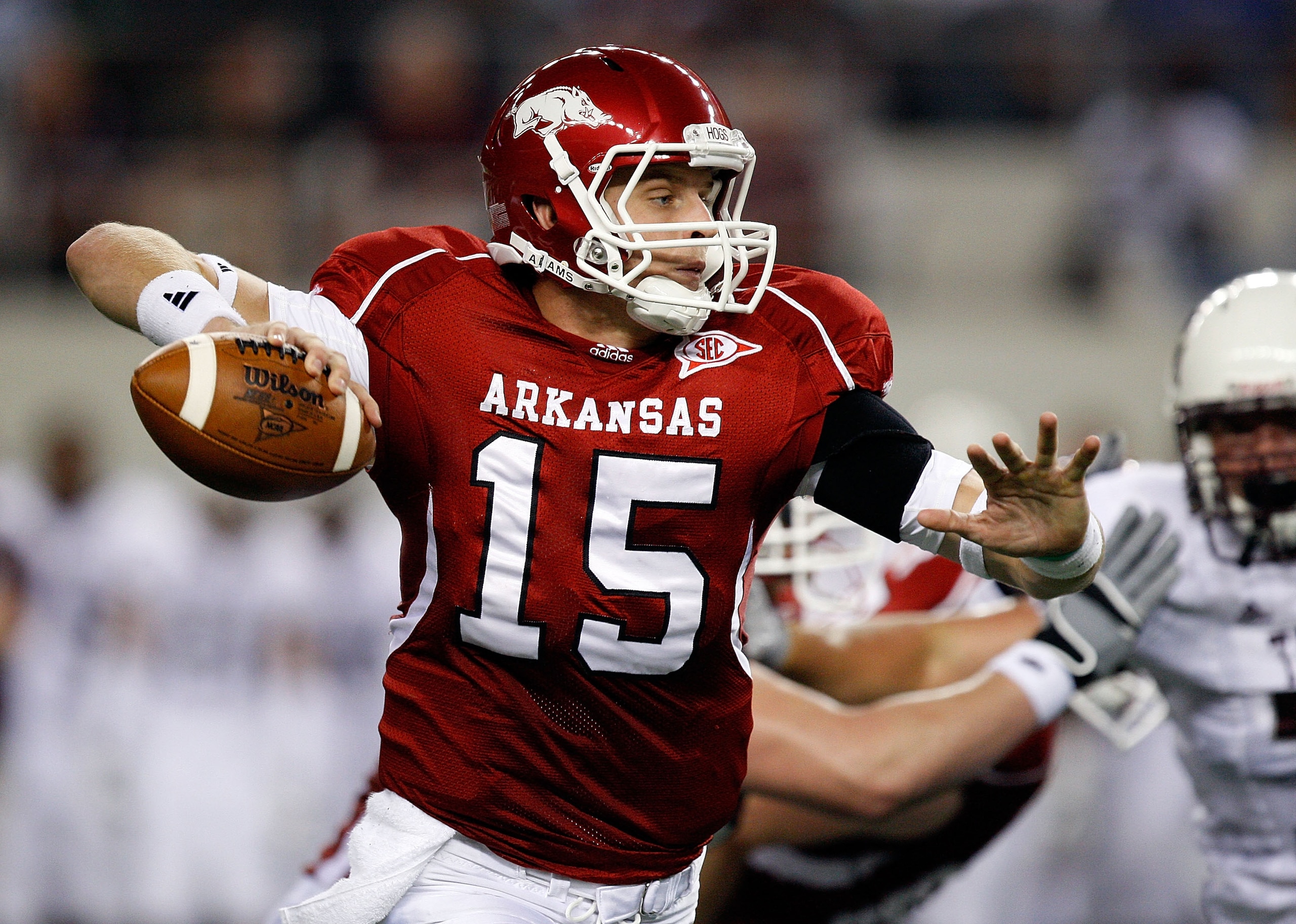 ARLINGTON, TX - OCTOBER 03:  Quarterback Ryan Mallett #15 of the Arkansas Razorbacks drops back to pass against the Texas A&M Aggies at Cowboys Stadium on October 3, 2009 in Arlington, Texas.  (Photo by Ronald Martinez/Getty Images)