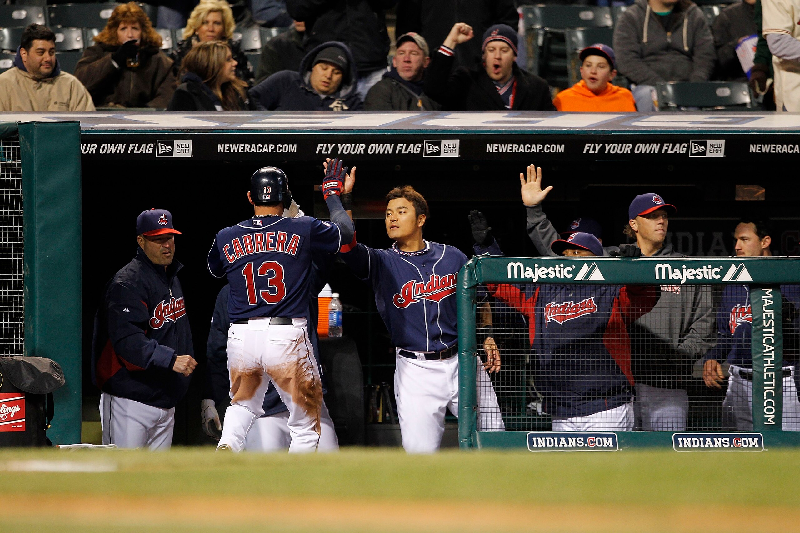 CLEVELAND - APRIL 05:  Asdrubal Cabrera #13 of the Cleveland Indians celebrates afer scoring during the fifth inning of the game against the Boston Red Sox at Progressive Field on April 5, 2011 in Cleveland, Ohio.  (Photo by Leon Halip/Getty Images)