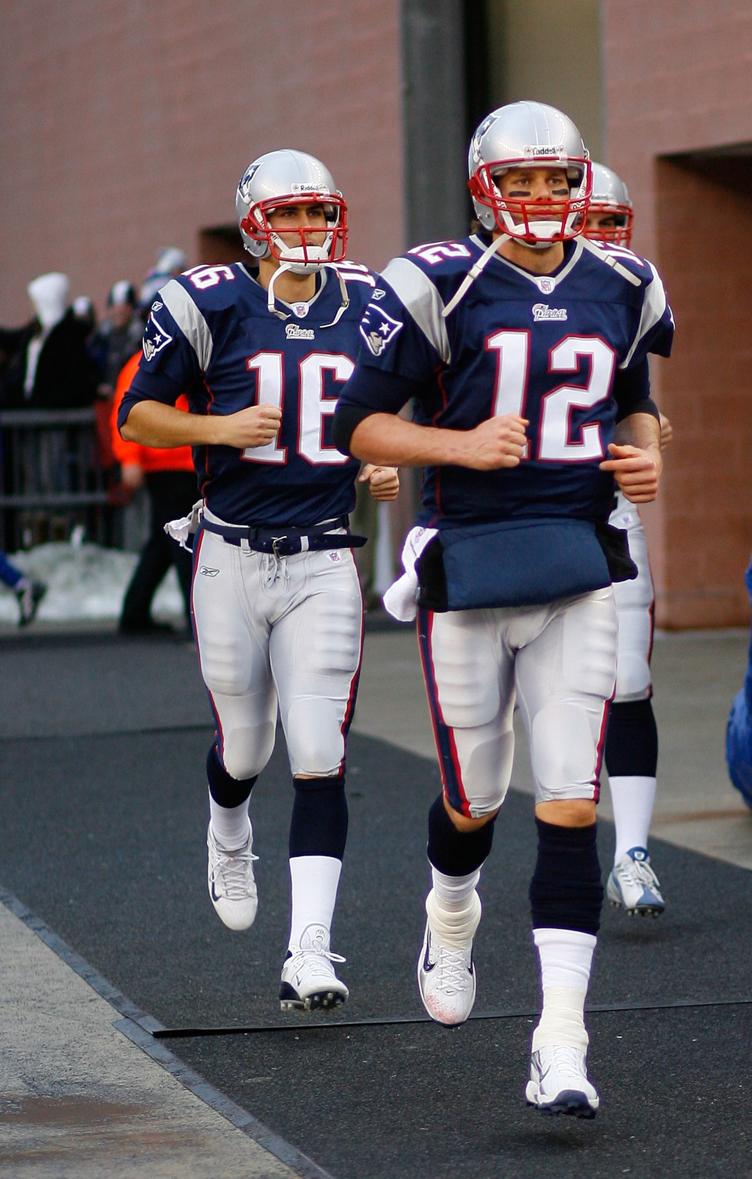 FOXBOROUGH, MA - DECEMBER 23: Matt Cassel #16 and Tom Brady #12 of the New England Patriots face the Miami Dolphins at Gillette Stadium on December 23, 2007 in Foxborough, Massachusetts. Patriots won 28-7. (Photo by Jim Rogash/Getty Images)