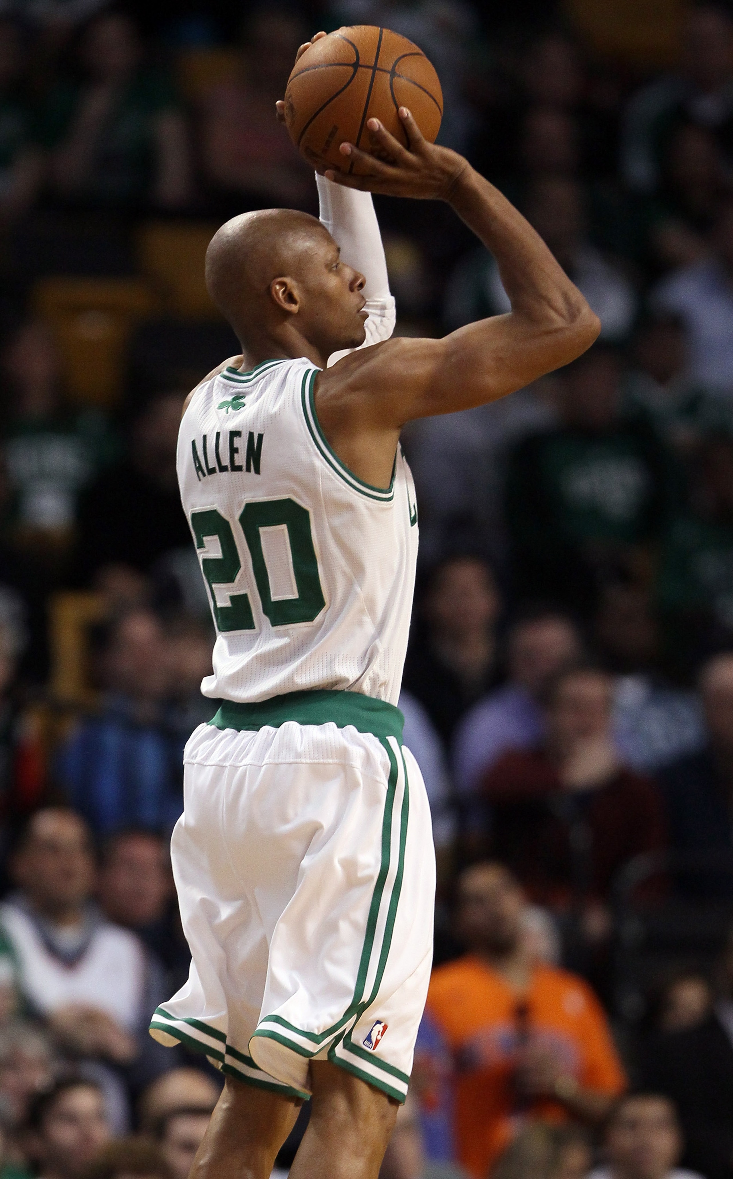 BOSTON, MA - APRIL 19: Ray Allen #20 of the Boston Celtics shoots a three point basket against the New York Knicks in Game Two of the Eastern Conference Quarterfinals in the 2011 NBA Playoffs on April 19, 2011 at the TD Garden in Boston, Massachusetts. T BOSTON, MA - APRIL 19: Ray Allen #20 of the Boston Celtics shoots a three point basket against the New York Knicks in Game Two of the Eastern Conference Quarterfinals in the 2011 NBA Playoffs on April 19, 2011 at the TD Garden in Boston, Massachusetts. T