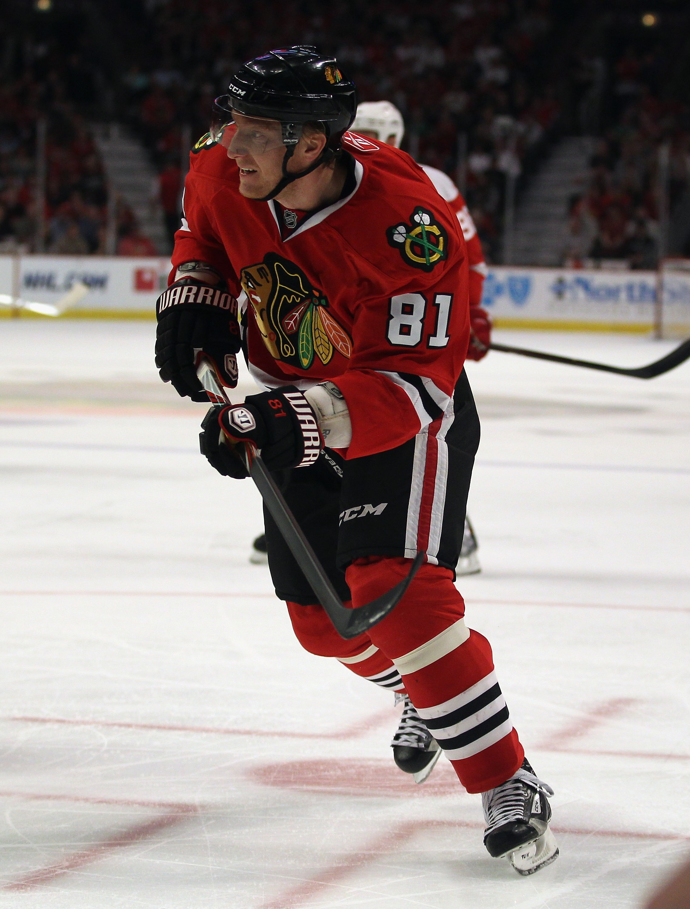CHICAGO, IL - APRIL 10: Marian Hossa #81 of the Chicago Blackhawks skates to the puck against the Detroit Red Wings at the United Center on April 10, 2011 in Chicago, Illinois. The Red Wings defeated the Blackhawks 4-3. (Photo by Jonathan Daniel/Getty Ima
