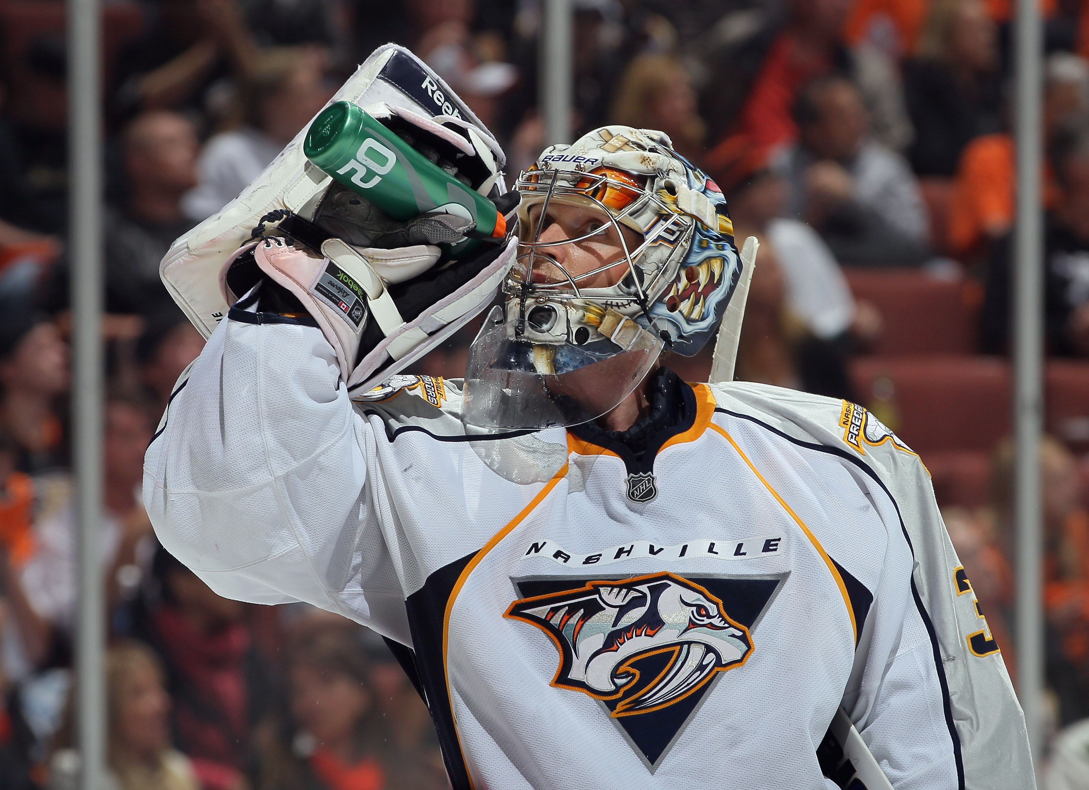 ANAHEIM, CA - APRIL 15:  Goaltender Pekka Rinne #35 of the Nashville Predators drinks during a time out against the Anaheim Ducks in Game Two of the Western Conference Quarterfinals during the 2011 NHL Stanley Cup Playoffs at Honda Center on April 15, 201