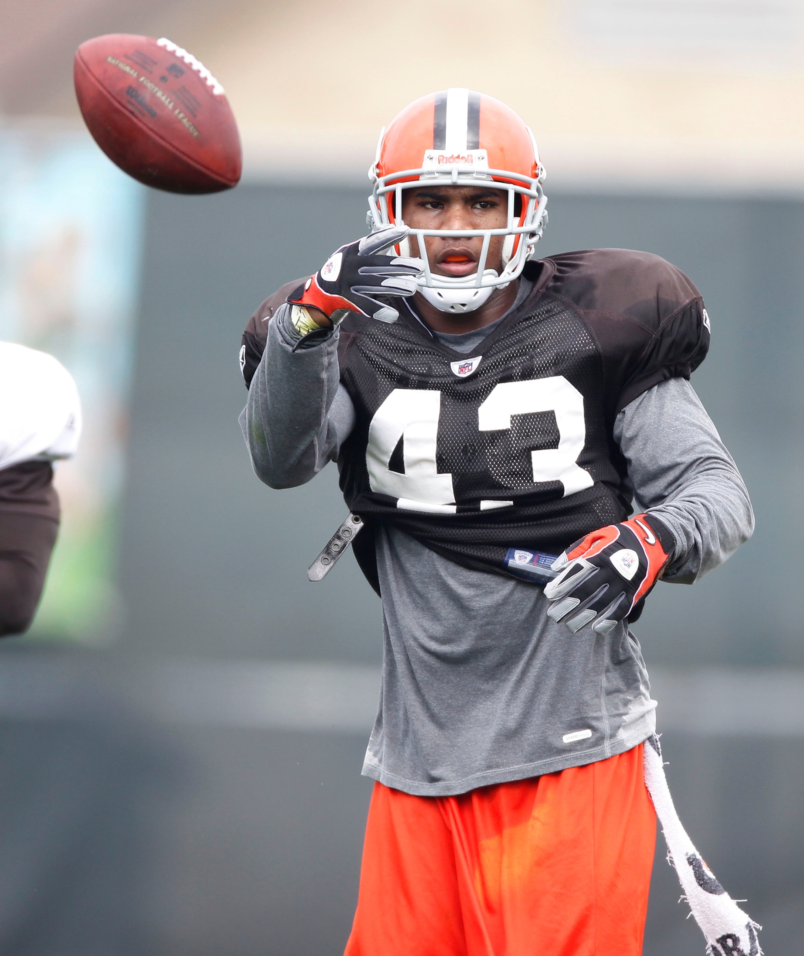 BEREA, OH - AUGUST 04:  T.J. Ward #43 of the Cleveland Browns flips the ball after a drill during training camp at the Cleveland Browns Training and Administrative Complex on August 4, 2010 in Berea, Ohio.  (Photo by Gregory Shamus/Getty Images)