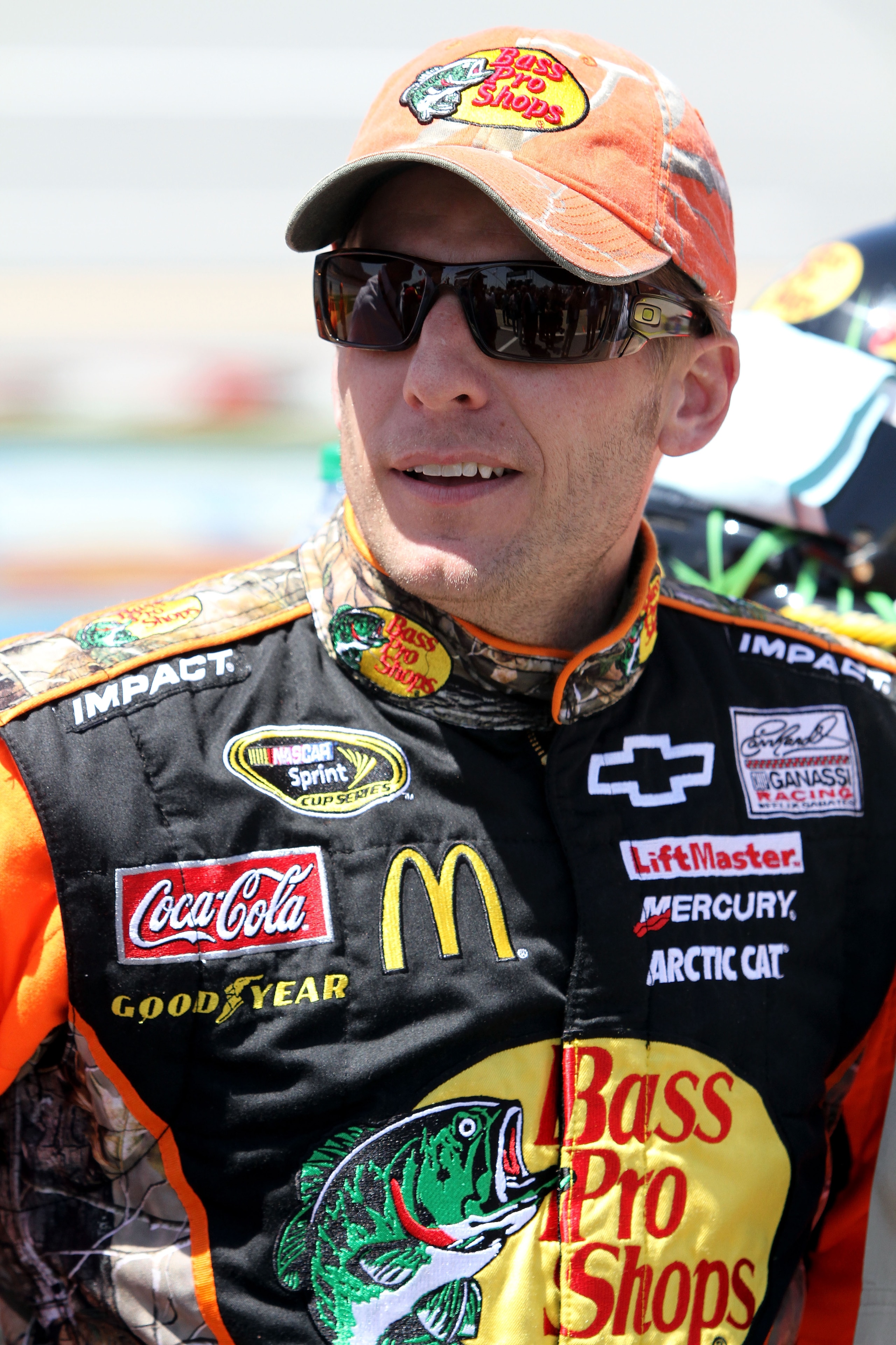 TALLADEGA, AL - APRIL 17:  Jamie McMurray, driver of the #1 Bass Pro Shops/Tracker Boats Chevrolet, stands on the grid prior to the start of the NASCAR Sprint Cup Series Aaron's 499 at Talladega Superspeedway on April 17, 2011 in Talladega, Alabama.  (Pho