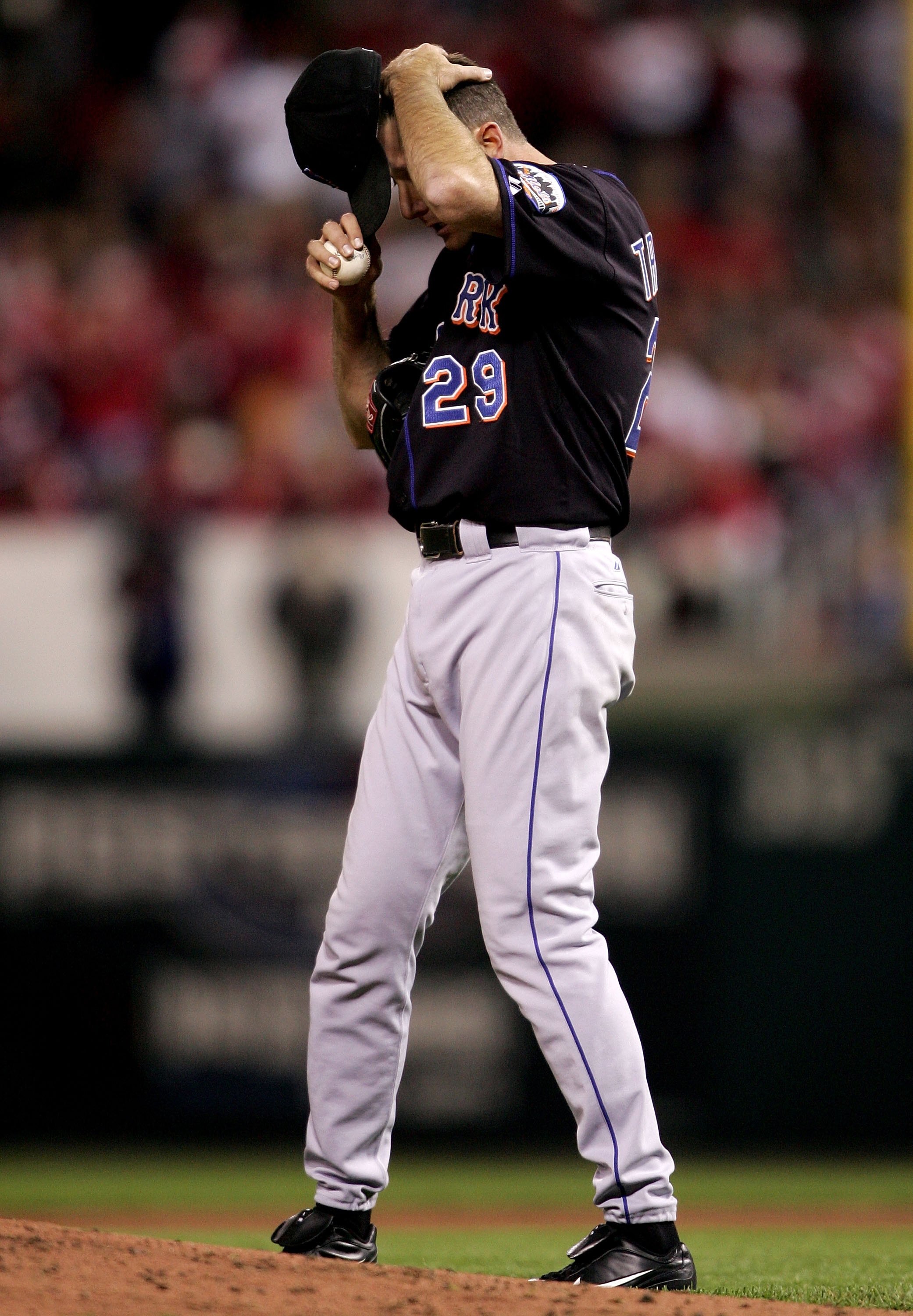 ST. LOUIS - OCTOBER 14:  Steve Trachsel #29 of the New York Mets adjusts his hat against the St. Louis Cardinals during game three of the NLCS at Busch Stadium on October 14, 2006 in St. Louis, Missouri.  (Photo by Elsa/Getty Images)