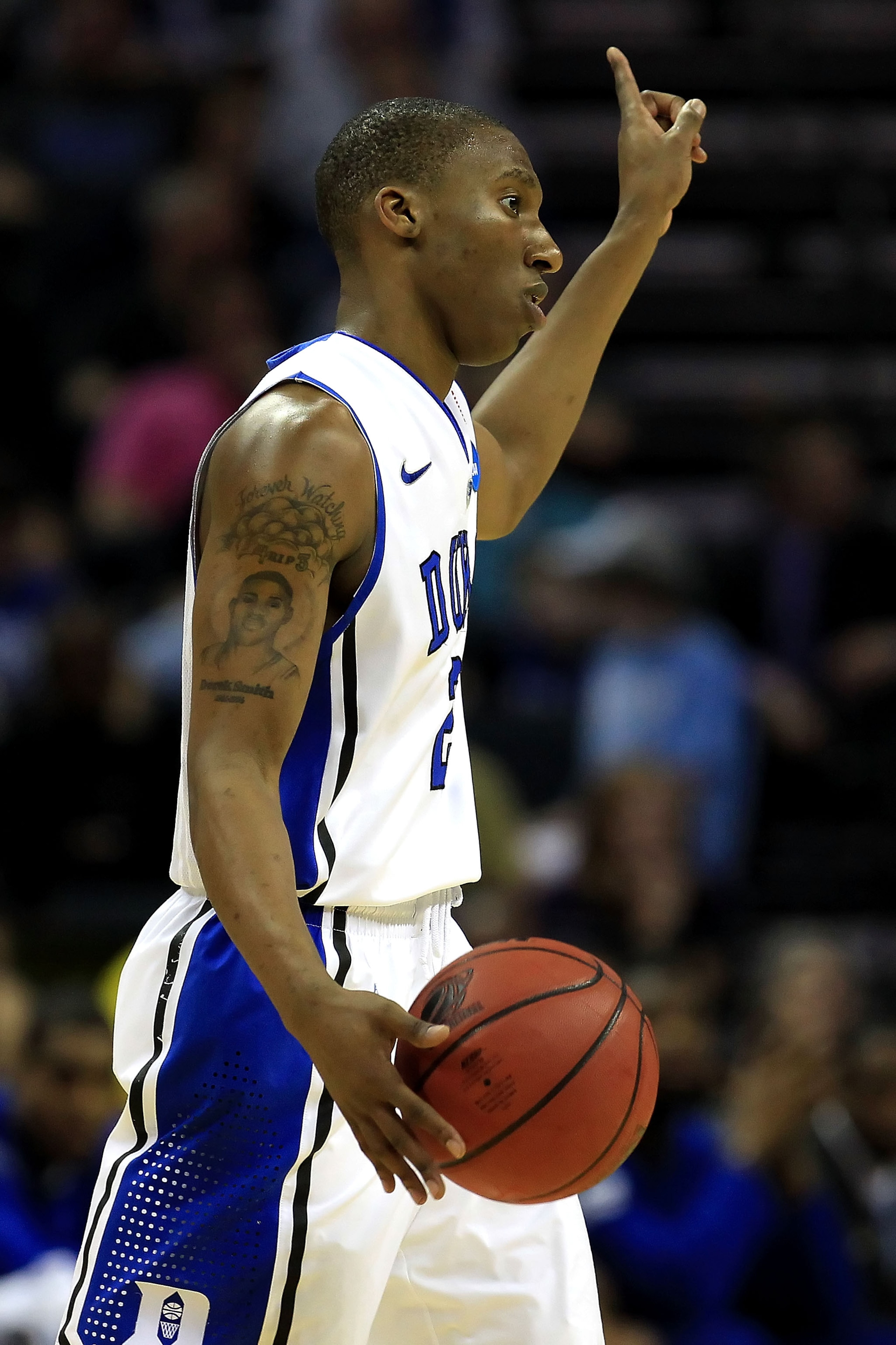 CHARLOTTE, NC - MARCH 18:  Nolan Smith #2 of the Duke Blue Devils calls a play in the first half while taking on the Hampton Pirates during the second round of the 2011 NCAA men's basketball tournament at Time Warner Cable Arena on March 18, 2011 in Charl