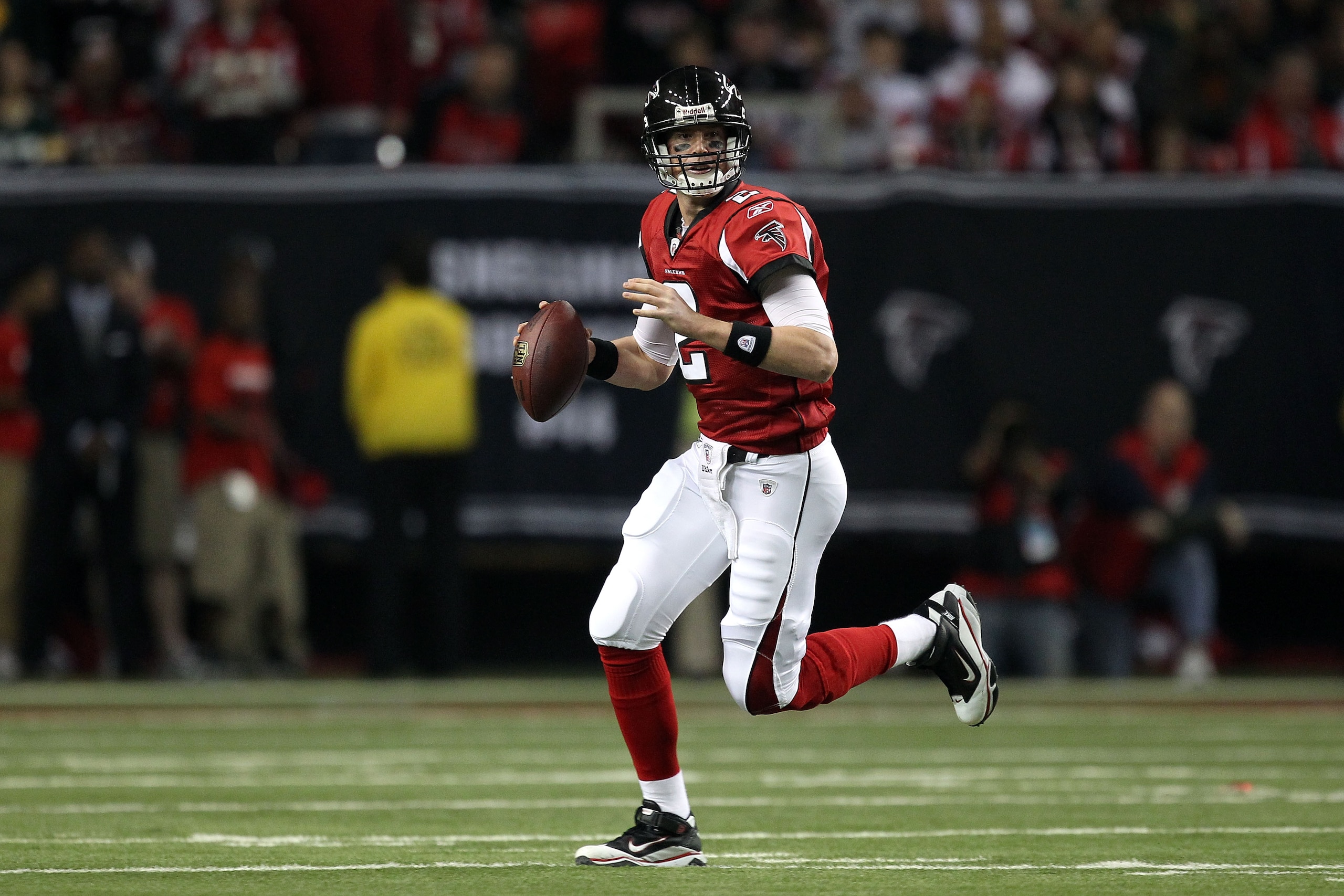 ATLANTA, GA - JANUARY 15:  Quarterback Matt Ryan #2 of the Atlanta Falcons rolls out to pass against the Green Bay Packers during their 2011 NFC divisional playoff game at Georgia Dome on January 15, 2011 in Atlanta, Georgia. The Packers won 48-21.  (Phot