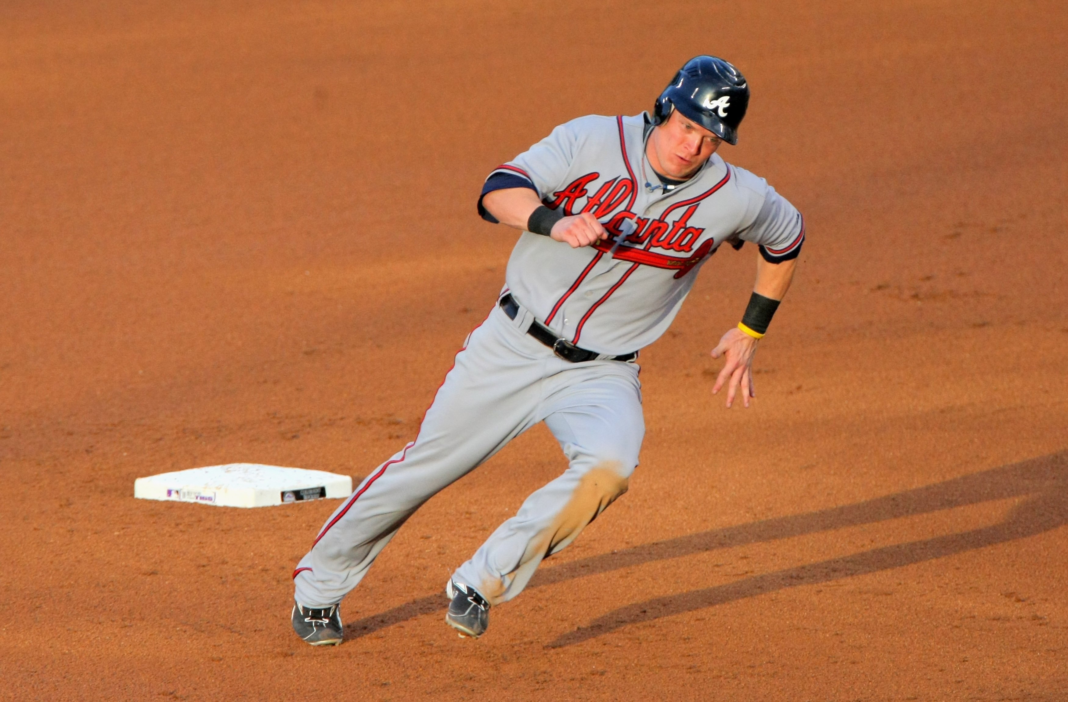 DENVER - JULY 09:  Nate McLouth #13 of the Atlanta Braves runs the bases against the Colorado Rockies during MLB action at Coors Field on July 9, 2009 in Denver, Colorado. The Rockies defeated the Braves 7-6.  (Photo by Doug Pensinger/Getty Images)