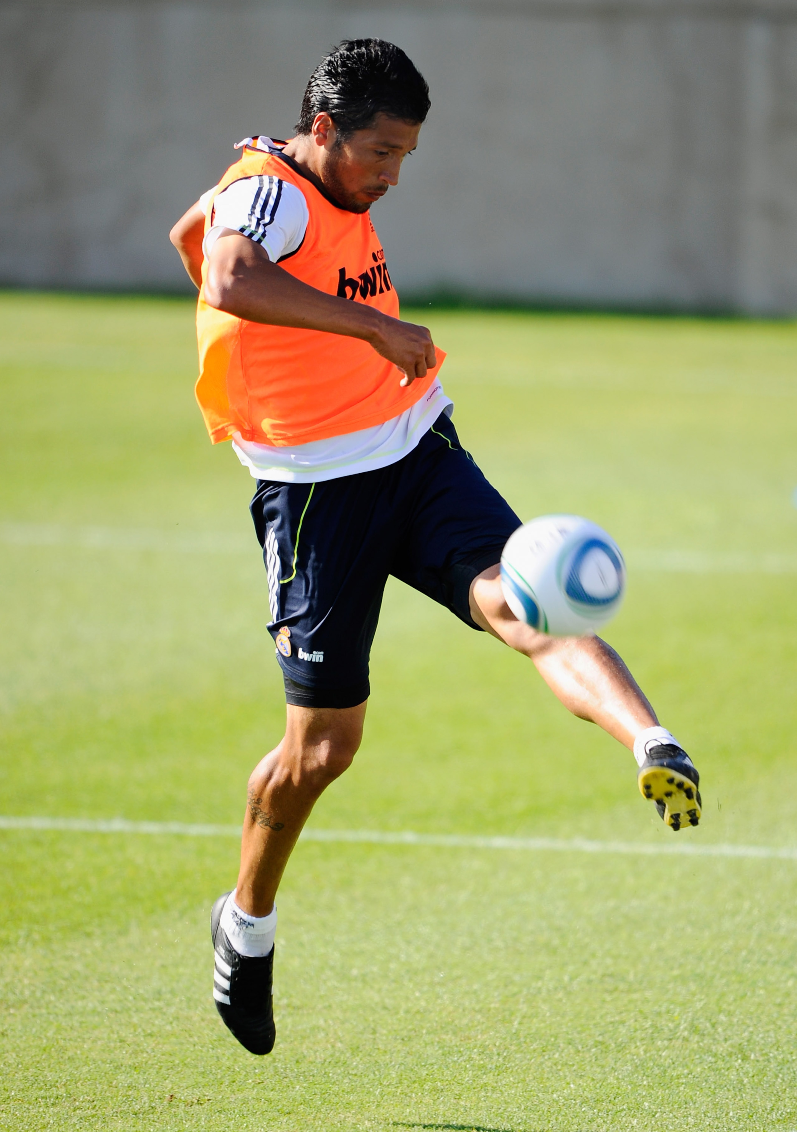 LOS ANGELES, CA - AUGUST 06:   Ezequiel Marcelo Garay #19 of Real Madrid kicks the ball during training session on the campus of UCLA on August 6, 2010 inthe Westwood section  Los Angeles, California. Real Madrid will play a pre-season friendly soccer mat