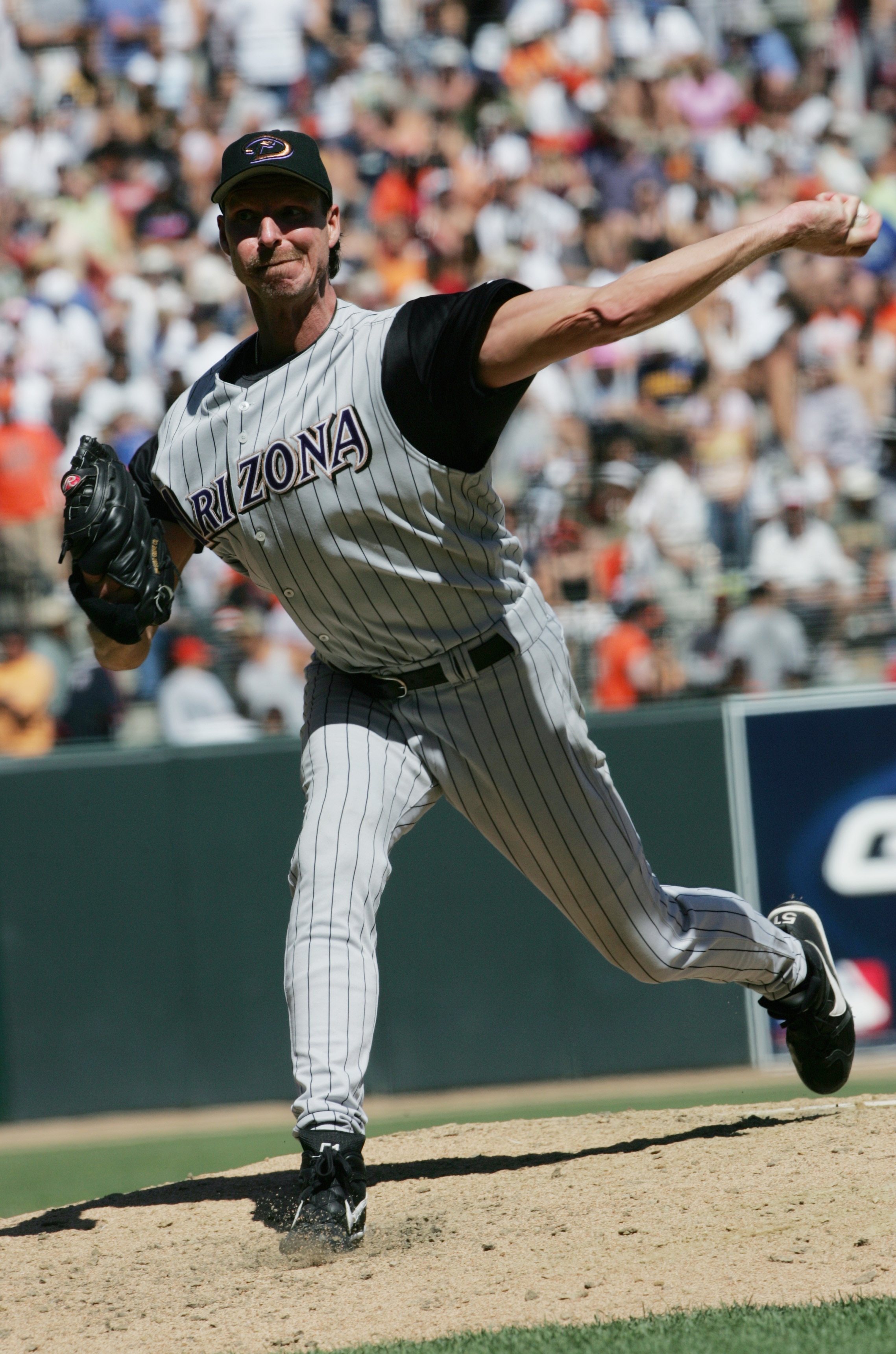 SAN FRANCISCO - SEPTEMBER 5:  Pitcher Randy Johnson #51 the Arizona Diamondbacks delivers against the San Francisco Giants during the game at SBC Park on September 5, 2004 in San Francisco, California. The Giants won 4-1.  (Photo by Stephen Dunn/Getty Ima