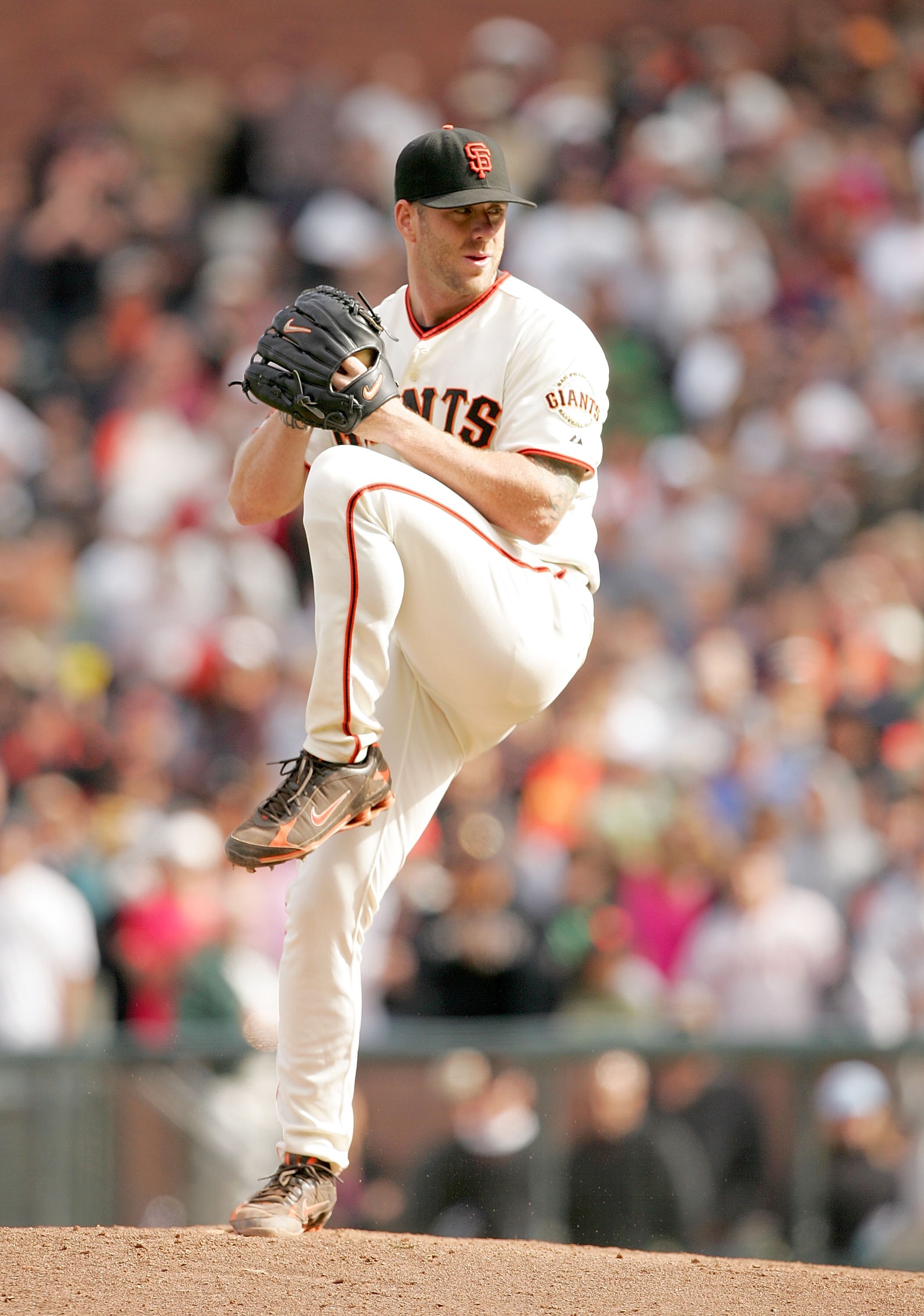 SAN FRANCISCO - AUGUST 30:  Brian Wilson #38 of the San Francisco Giants pitches against the Colorado Rockies at AT&T Park on August 30, 2009 in San Francisco, California.  (Photo by Ezra Shaw/Getty Images)