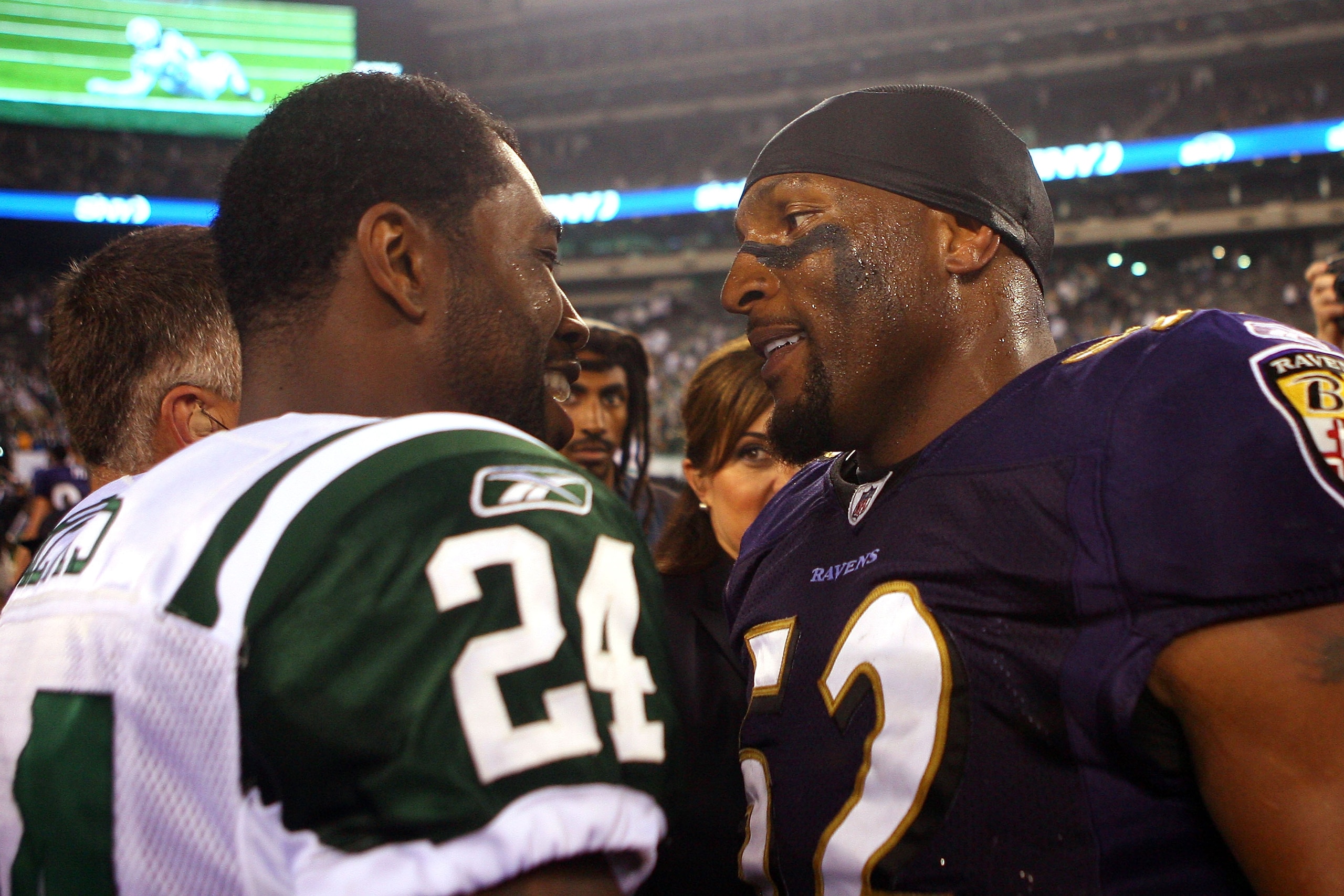EAST RUTHERFORD, NJ - SEPTEMBER 13:  Ray Lewis #52 of the Baltimore Ravens talks to Darrelle Revis #24 of the New York Jets after defeating the New York Jets in their home opener at the New Meadowlands Stadium on September 13, 2010 in East Rutherford, New