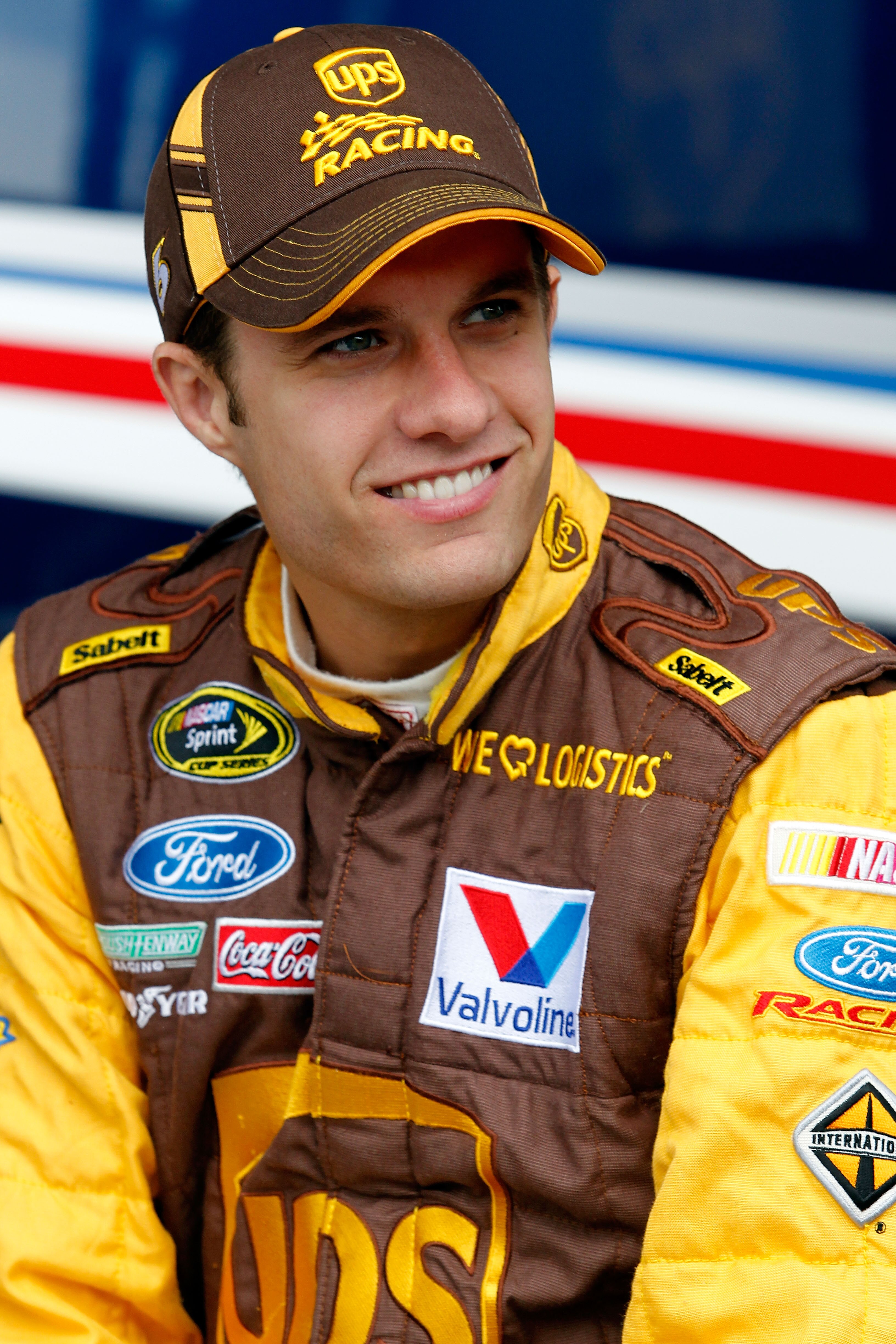 TALLADEGA, AL - APRIL 15:  David Ragan, driver of the #6 UPS Ford, sits in the garage area during practice for the NASCAR Sprint Cup Series Aaron's 499 at Talladega Superspeedway on April 15, 2011 in Talladega, Alabama.  (Photo by Todd Warshaw/Getty Image