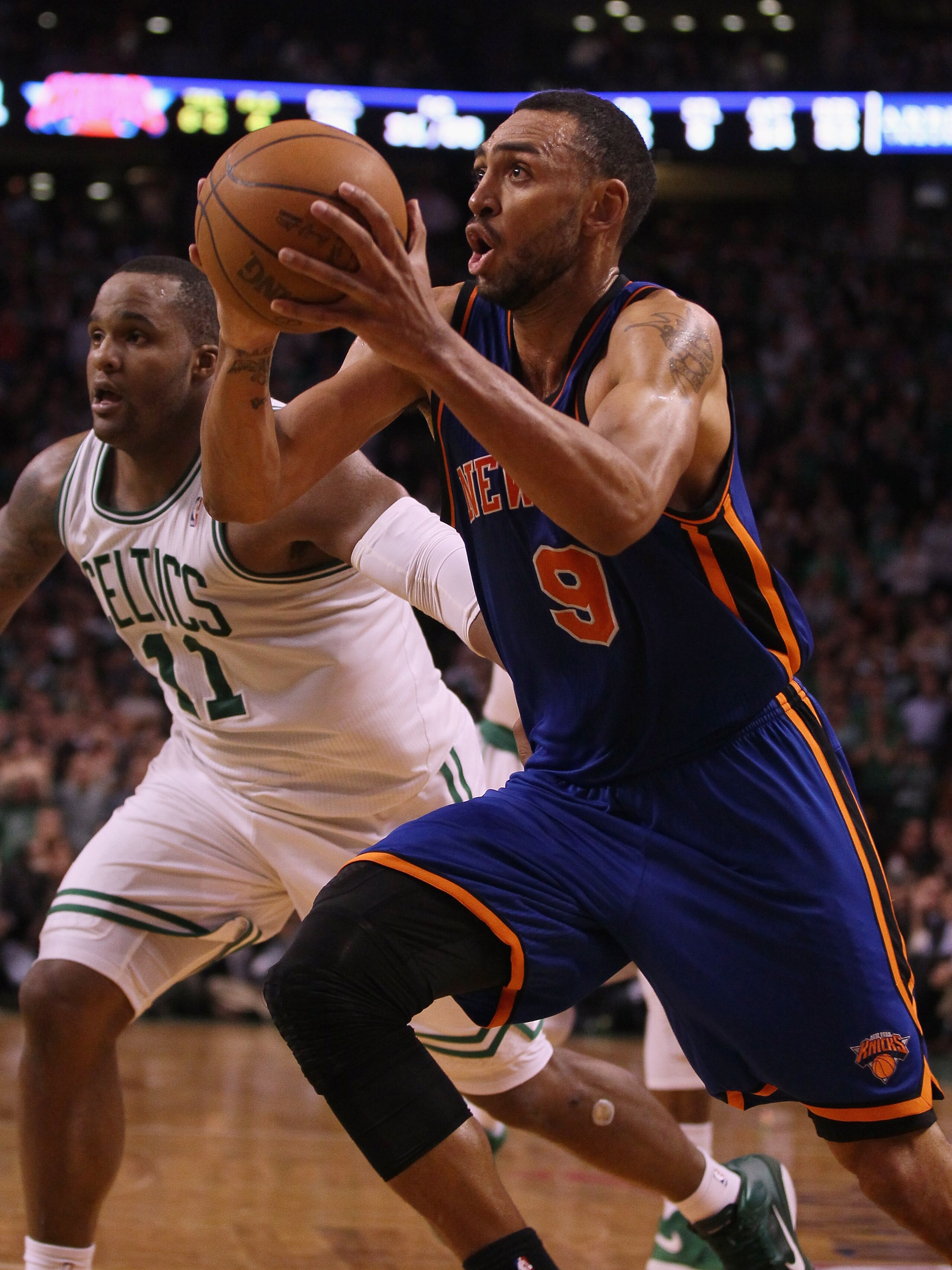 BOSTON, MA - APRIL 19:  Jared Jeffries #9 of the New York Knicks drives to the net as Glen Davis #11 of the Boston Celtics in Game Two of the Eastern Conference Quarterfinals in the 2011 NBA Playoffs on April 19, 2011 at the TD Garden in Boston, Massachus