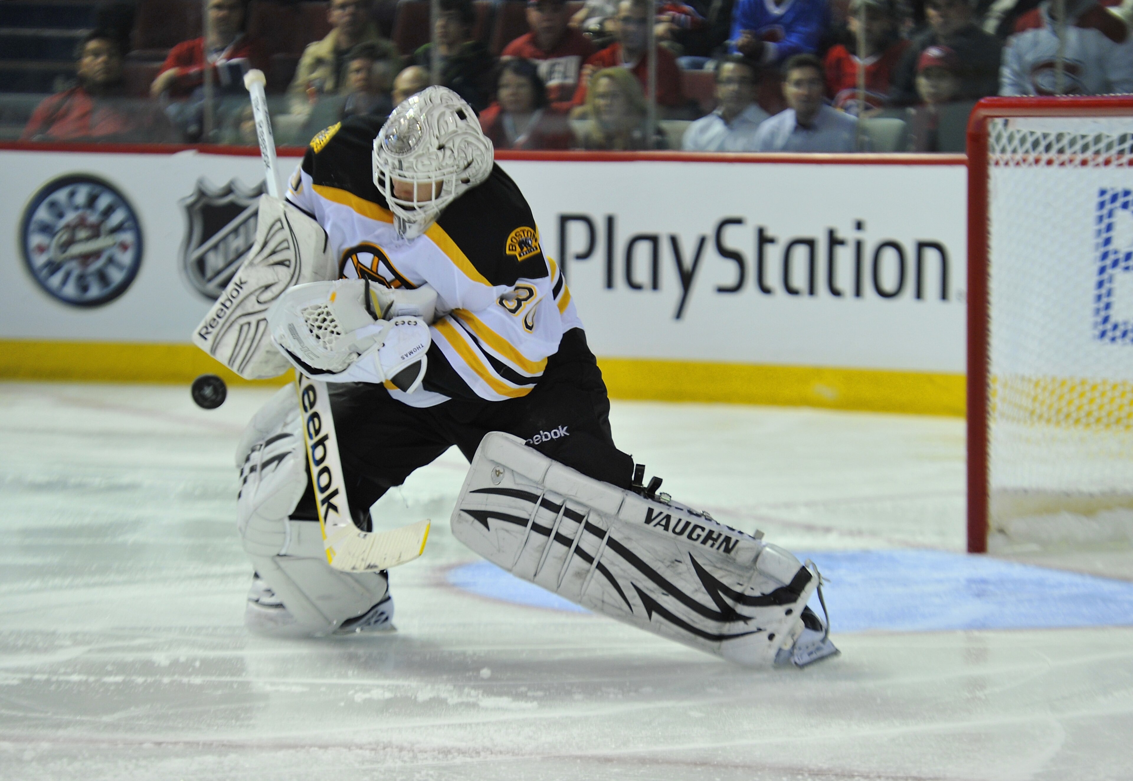 MONTREAL, CANADA - APRIL 18: Tim Thomas #30 of the Boston Bruins makes a save against the Montreal Canadiens in Game Three of the Eastern Conference Quarterfinals during the 2011 NHL Stanley Cup Playoffs at the Bell Centre on April 18, 2011 in Montreal, MONTREAL, CANADA - APRIL 18: Tim Thomas #30 of the Boston Bruins makes a save against the Montreal Canadiens in Game Three of the Eastern Conference Quarterfinals during the 2011 NHL Stanley Cup Playoffs at the Bell Centre on April 18, 2011 in Montreal,