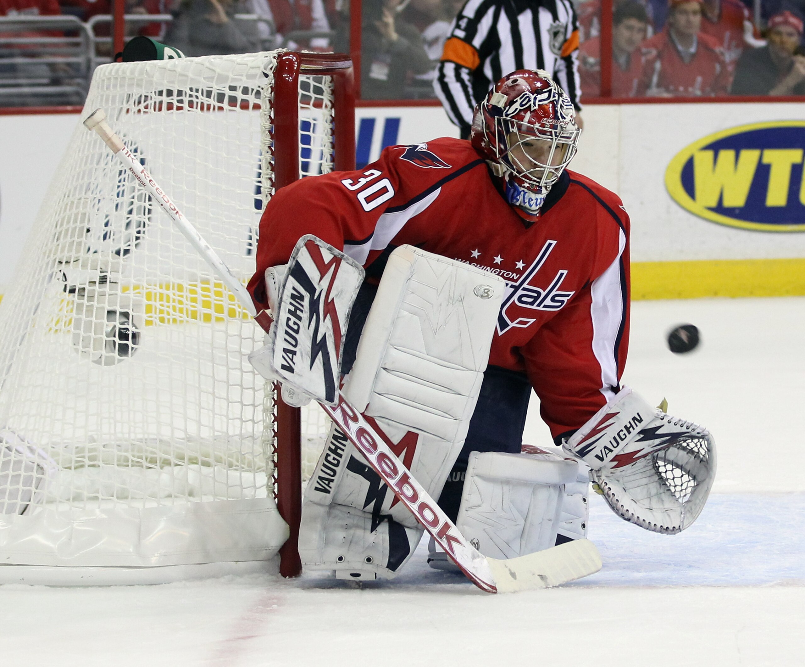 WASHINGTON, DC - APRIL 15:  Michal Neuvirth #30 of the Washington Capitals makes the save against the New York Rangers in Game Two of the Eastern Conference Quarterfinals during the 2011 NHL Stanley Cup Playoffs at Verizon Center on April 15, 2011 in Wash