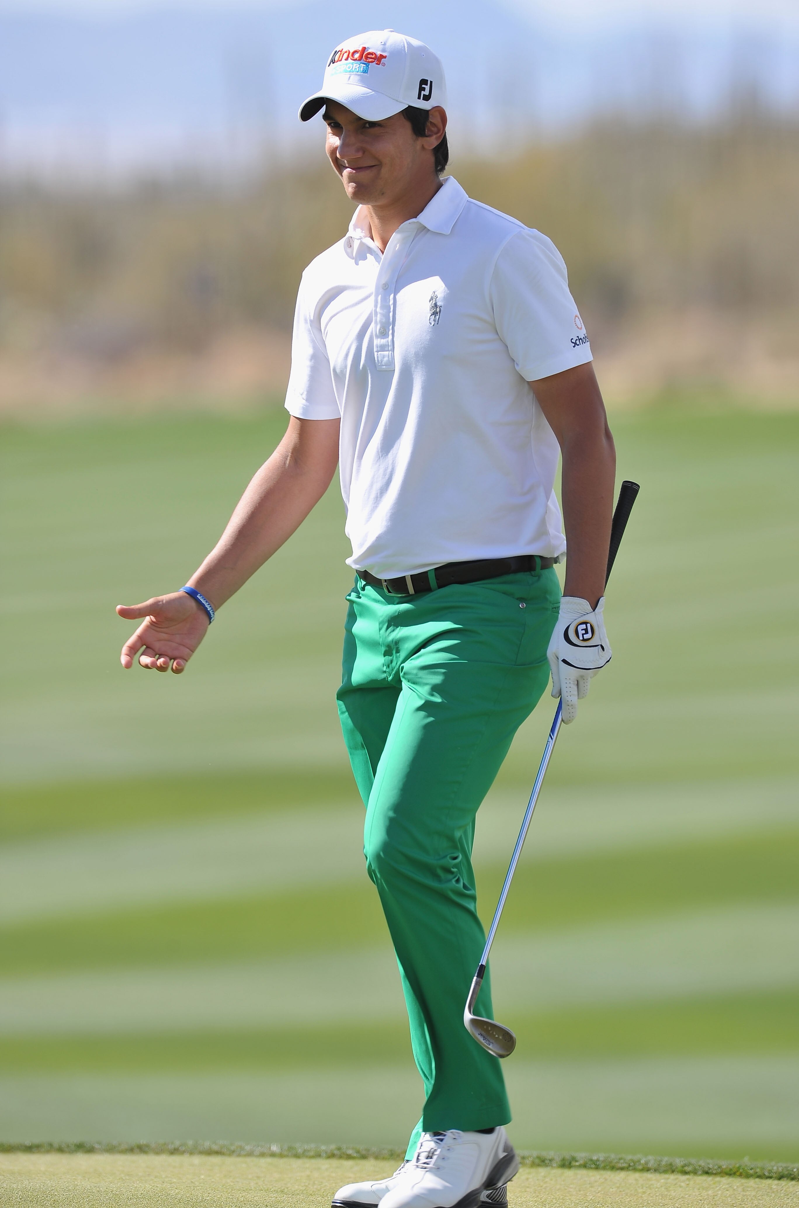 MARANA, AZ - FEBRUARY 25:  Matteo Manassero of Italy celebrates his chipping in on the 13th hole during the third round of the Accenture Match Play Championship at the Ritz-Carlton Golf Club on February 25, 2011 in Marana, Arizona.  (Photo by Stuart Frank
