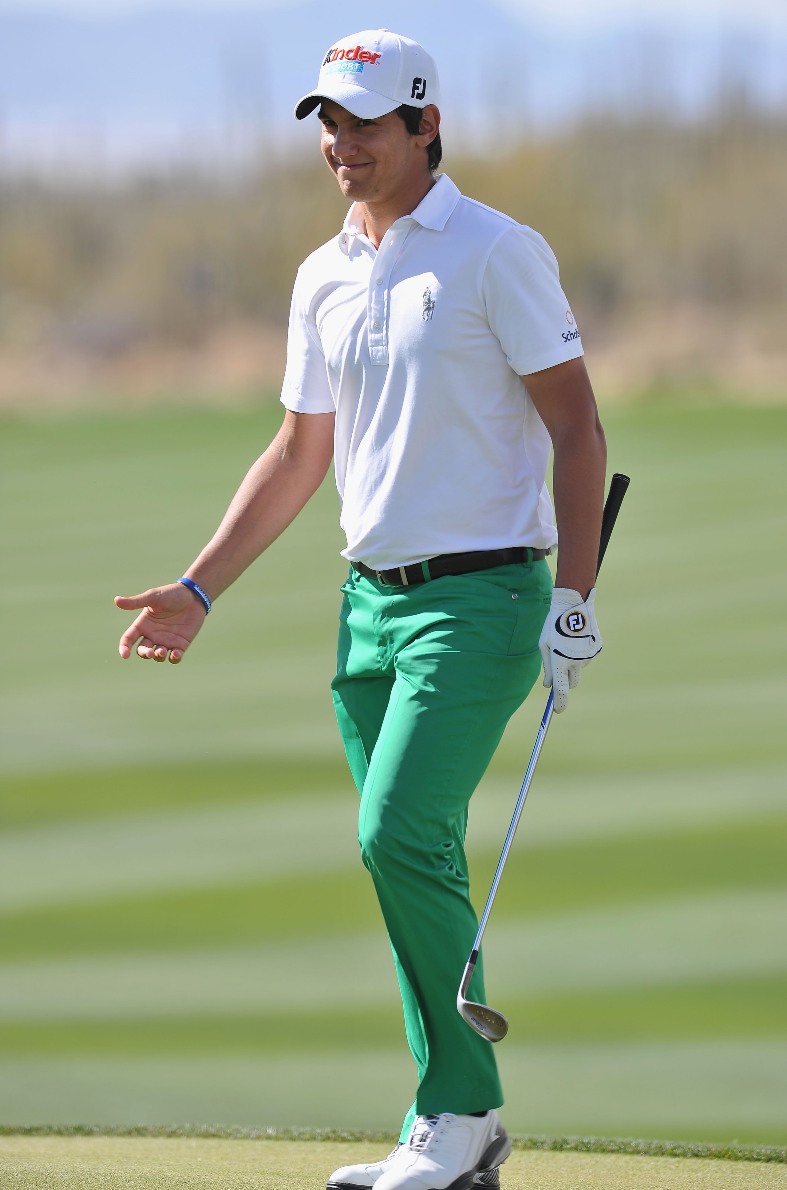 MARANA, AZ - FEBRUARY 25:  Matteo Manassero of Italy celebrates his chipping in on the 13th hole during the third round of the Accenture Match Play Championship at the Ritz-Carlton Golf Club on February 25, 2011 in Marana, Arizona.  (Photo by Stuart Frank