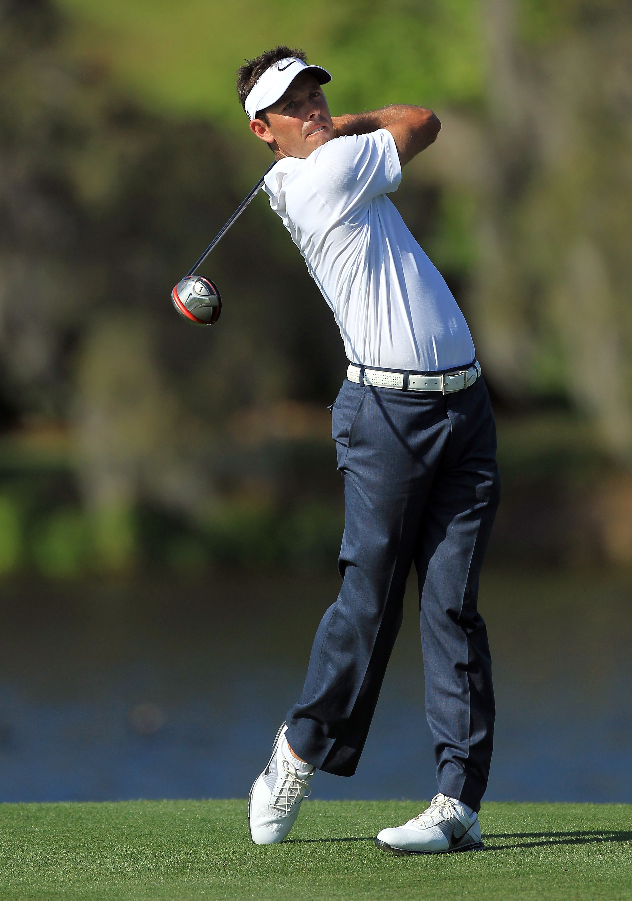 ORLANDO, FL - MARCH 24:  Charl Schwartzel of South Africa plays his tee shot at the 16th hole during the first round of the 2011 Arnold Palmer Invitational presented by Mastercard at the Bay Hill Lodge and Country Club on March 24, 2011 in Orlando, Florid