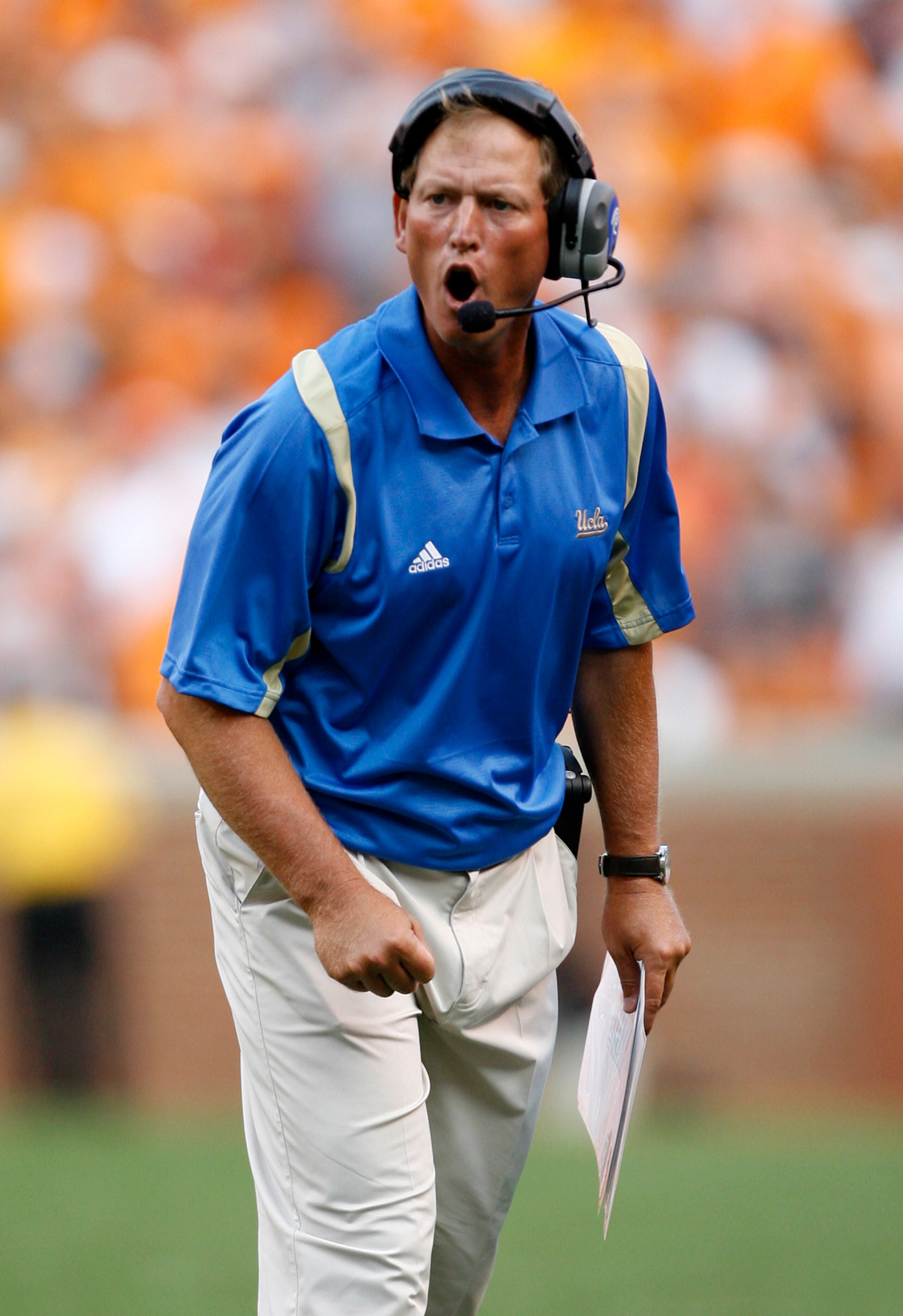 KNOXVILLE, TN - SEPTEMBER 12: Rick Neuheisel, head coach of the UCLA Bruins reacts against the Tennessee Volunteers on September 12, 2009 at Neyland Stadium in Knoxville, Tennessee. The Bruins beat the Volunteers 19-15. (Photo by Joe Murphy/Getty Images)