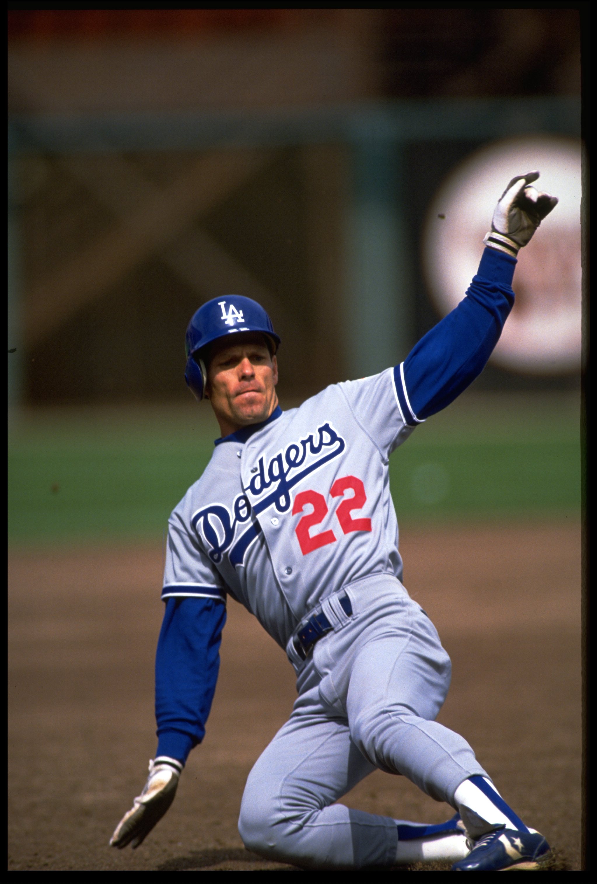 1992:  LOS ANGELES DODGERS CENTER FIELDER Brett BUTLER SLIDES INTO THIRD BASE DURING THE DODGERS VERSUS SAN FRANCISCO GIANTS GAME AT SAN FRANCISCO, CALIFORNIA.