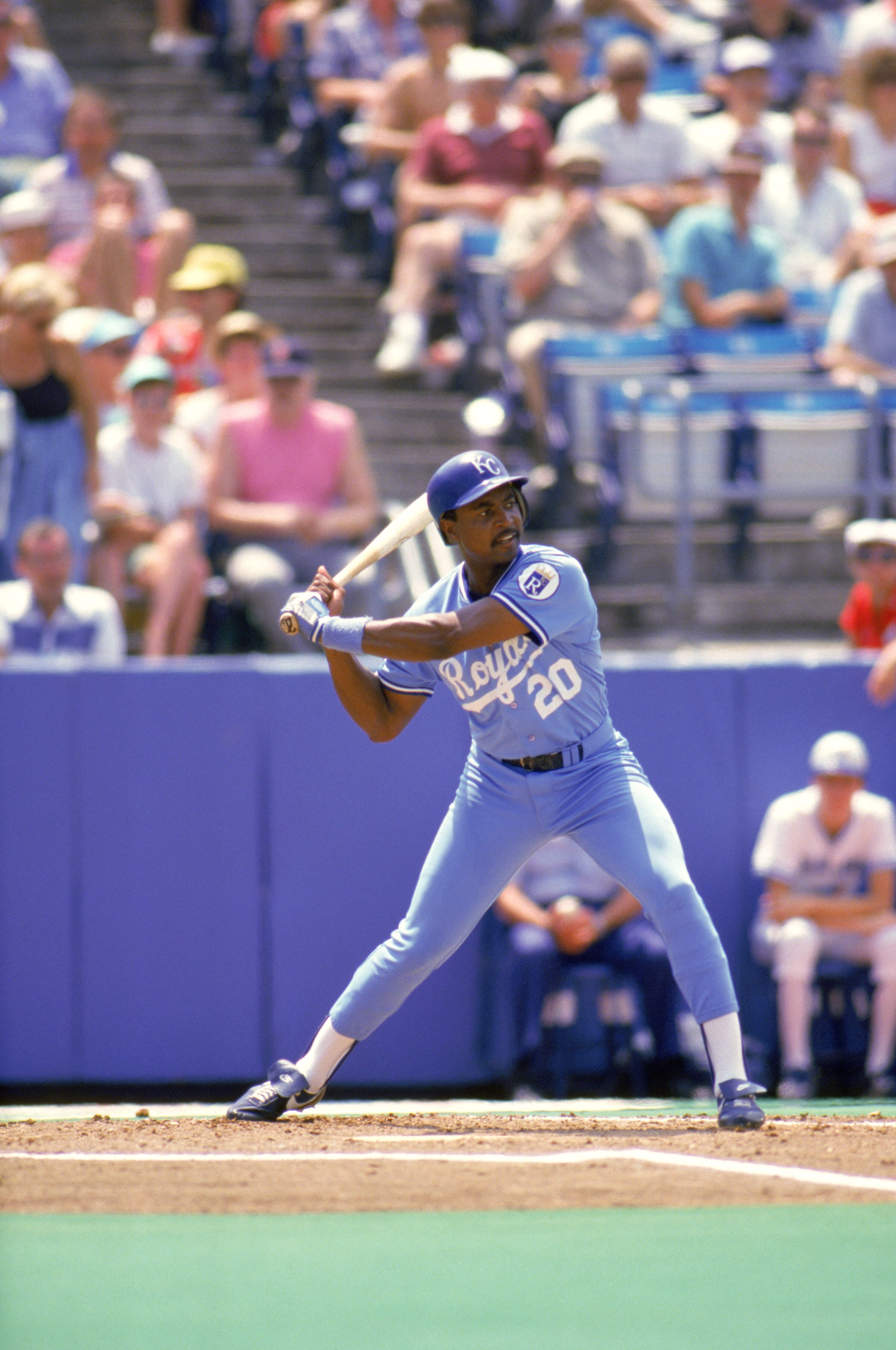 1986:  Frank White #20 of the Kansas City Royals stands ready at the plate during a game in 1986.  (Photo by Rick Stewart/Getty Images