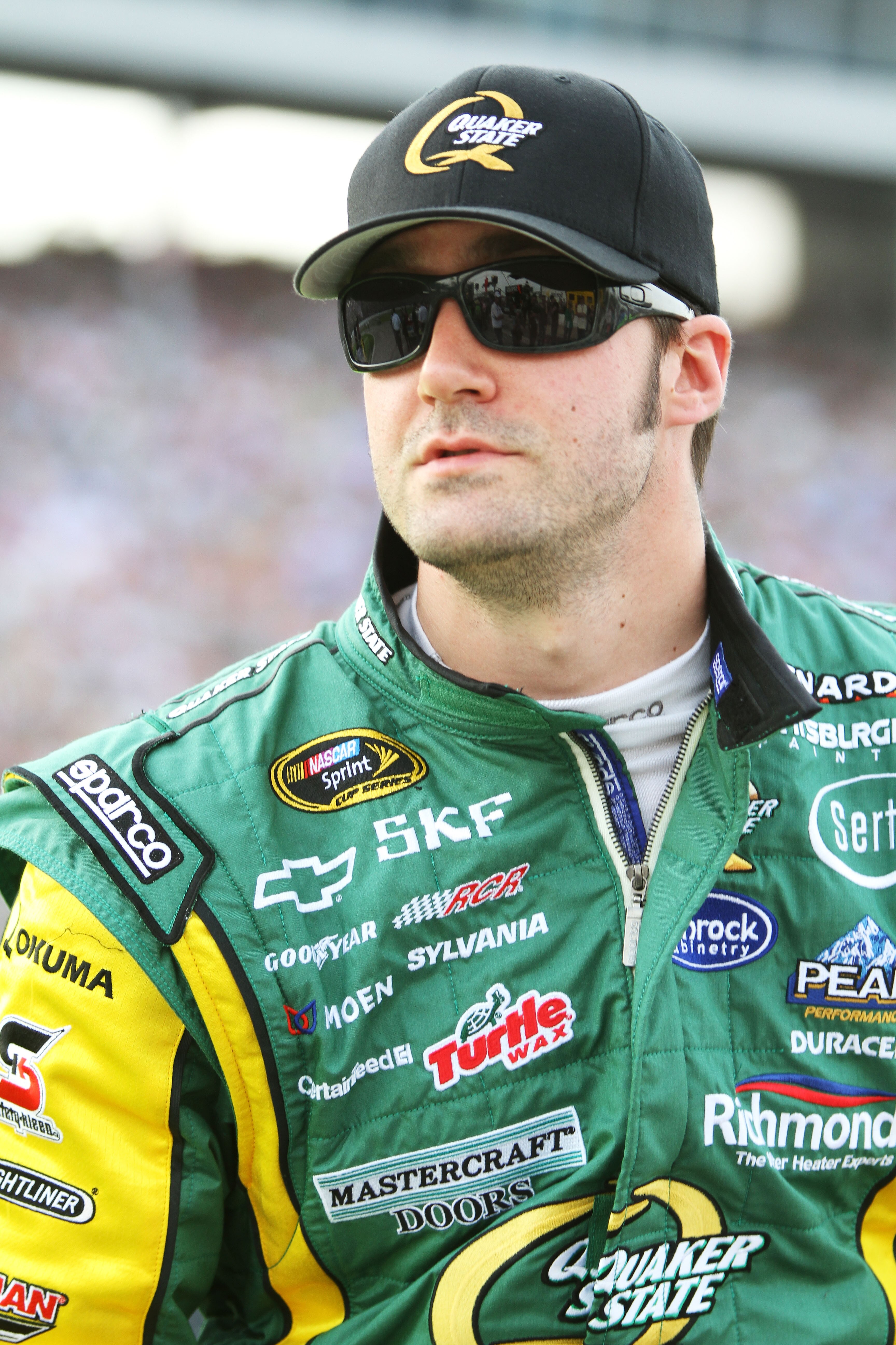 FORT WORTH, TX - APRIL 09:  Paul Menard, driver of the #27 Quaker State/Menards Chevrolet, stands on the grid prior to the NASCAR Sprint Cup Series Samsung Mobile 500 at Texas Motor Speedway on April 9, 2011 in Fort Worth, Texas.  (Photo by Jerry Markland
