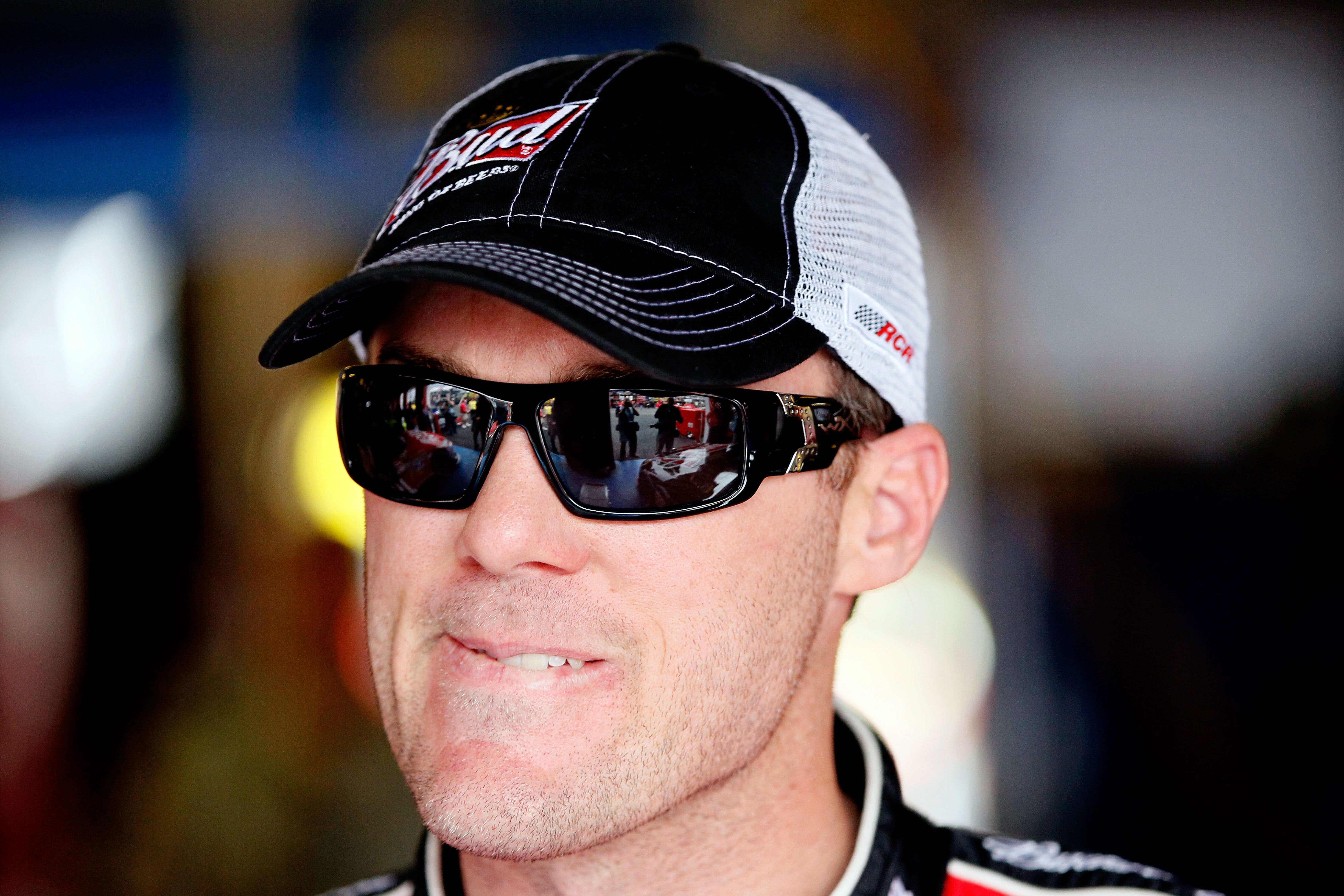 TALLADEGA, AL - APRIL 15:  Kevin Harvick, driver of the #29 Budweiser Chevrolet, stands in the garage during practice for the NASCAR Sprint Cup Series Aaron's 499 at Talladega Superspeedway on April 15, 2011 in Talladega, Alabama.  (Photo by Kevin C. Cox/