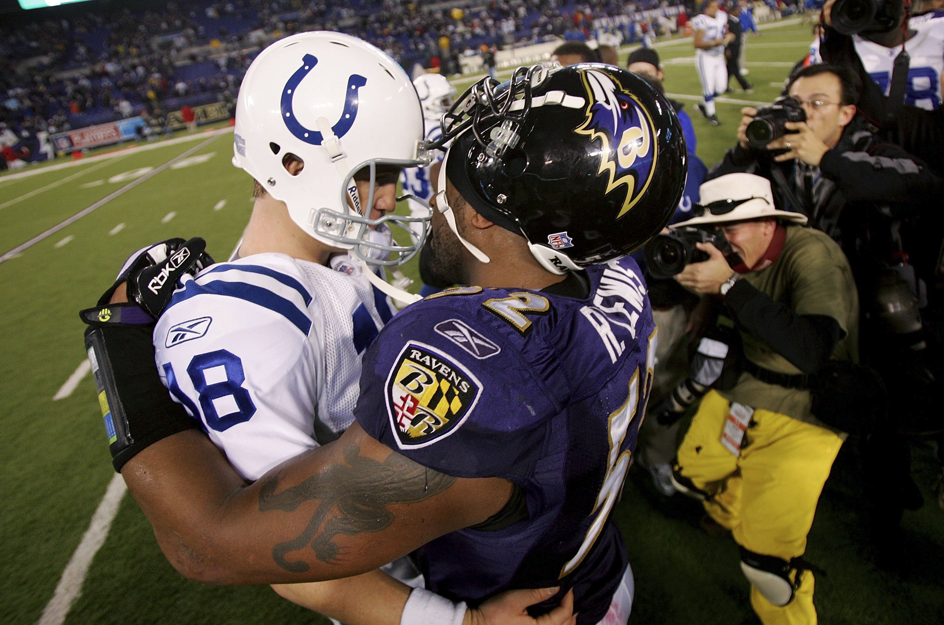 BALTIMORE - JANUARY 13:  Quarterback Peyton Manning #18 and Ray Lewis #52 of the Baltimore Ravens embrace after the Colts defeated the Ravens 15-6 during their AFC Divisional Playoff game on January 13, 2007 at M&T Bank Stadium in Baltimore, Maryland.  (P