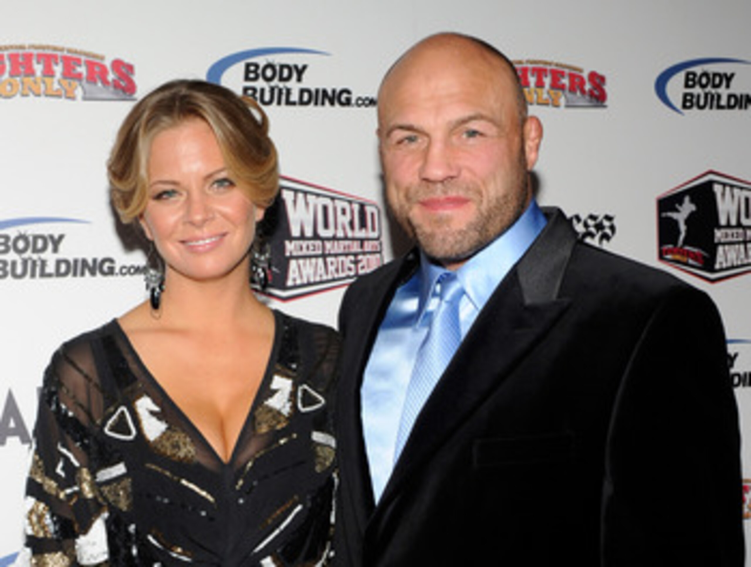 LAS VEGAS, NV - DECEMBER 01: Annie Stanley (L) and mixed martial artist and actor Randy Couture arrive at the third annual Fighters Only World Mixed Martial Arts Awards 2010 at the Palms Casino Resort December 1, 2010 in Las Vegas, Nevada. (Photo by Eth LAS VEGAS, NV - DECEMBER 01: Annie Stanley (L) and mixed martial artist and actor Randy Couture arrive at the third annual Fighters Only World Mixed Martial Arts Awards 2010 at the Palms Casino Resort December 1, 2010 in Las Vegas, Nevada. (Photo by Eth