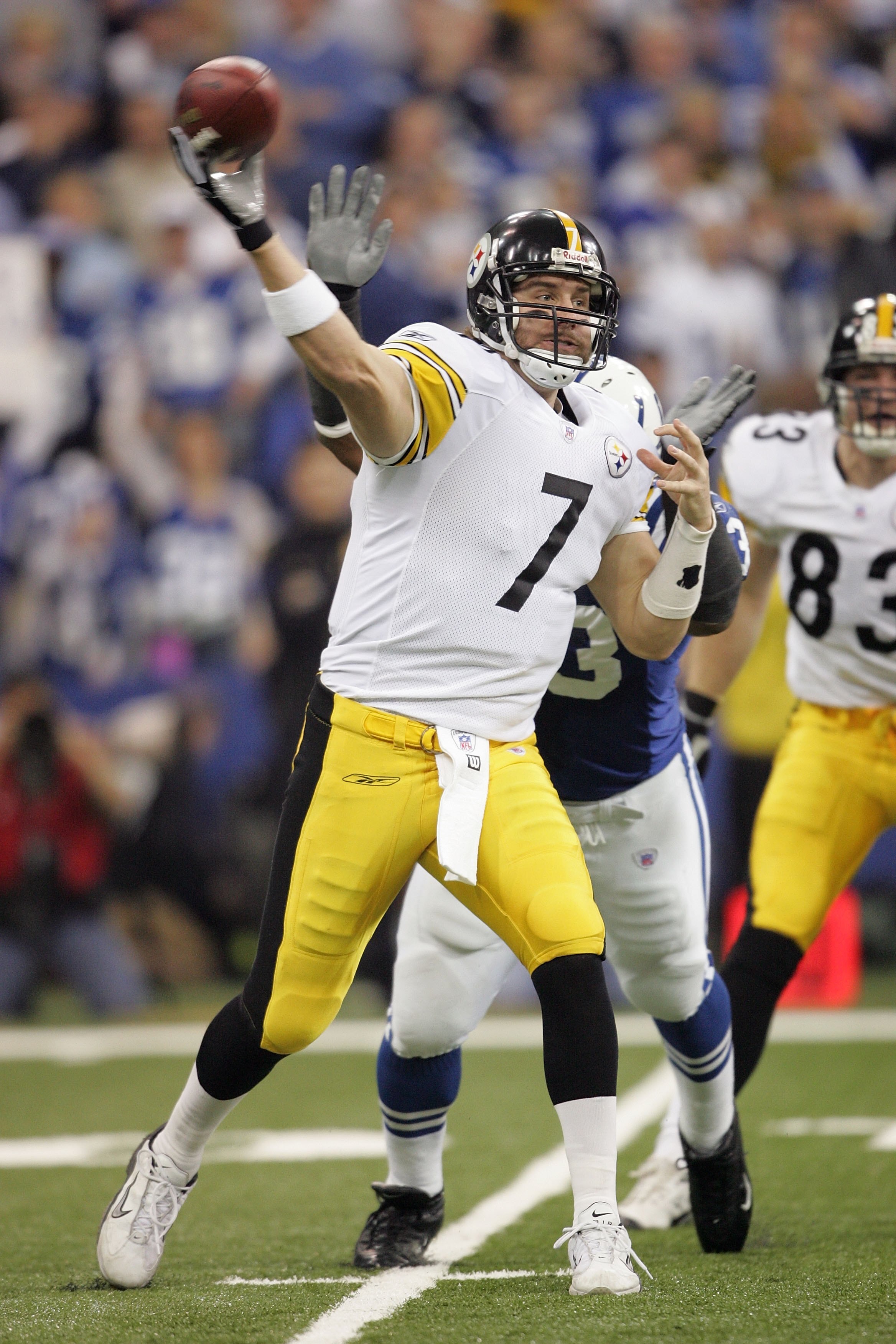 INDIANAPOLIS - JANUARY 15:  Ben Roethlisberger #7 of the Pittsburgh Steelers throws a pass under pressure by Dwight Freenery #93 of the Indianapolis Colts during the AFC Divisional Playoffs January 15, 2006 at the RCA Dome in Indianapolis, Indiana.  (Phot