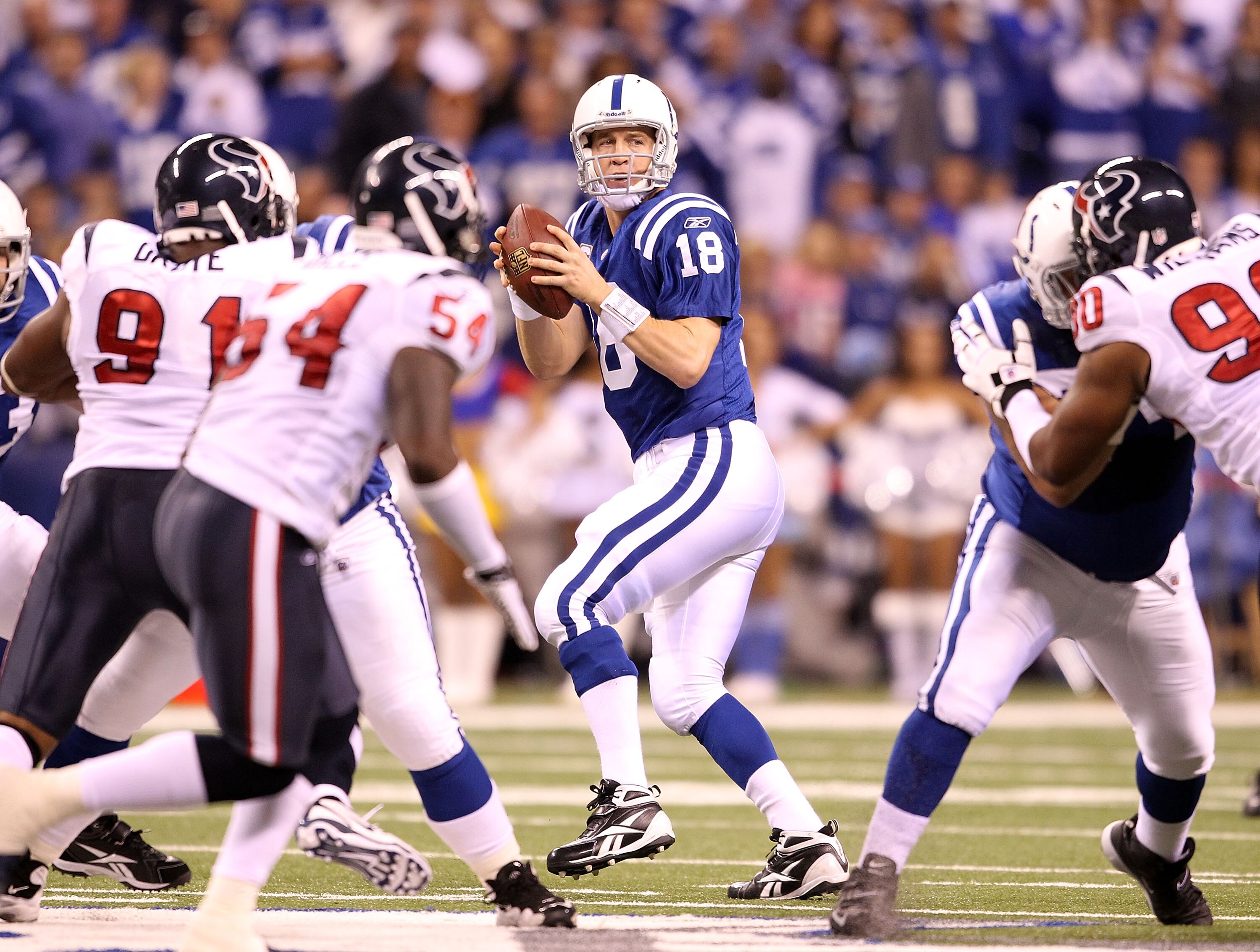 INDIANAPOLIS - NOVEMBER 01:  Peyton Manning #18 of Indianapolis Colts throws a pass during the NFL game against the Houston Texans  at Lucas Oil Stadium on November 1, 2010 in Indianapolis, Indiana.  (Photo by Andy Lyons/Getty Images)