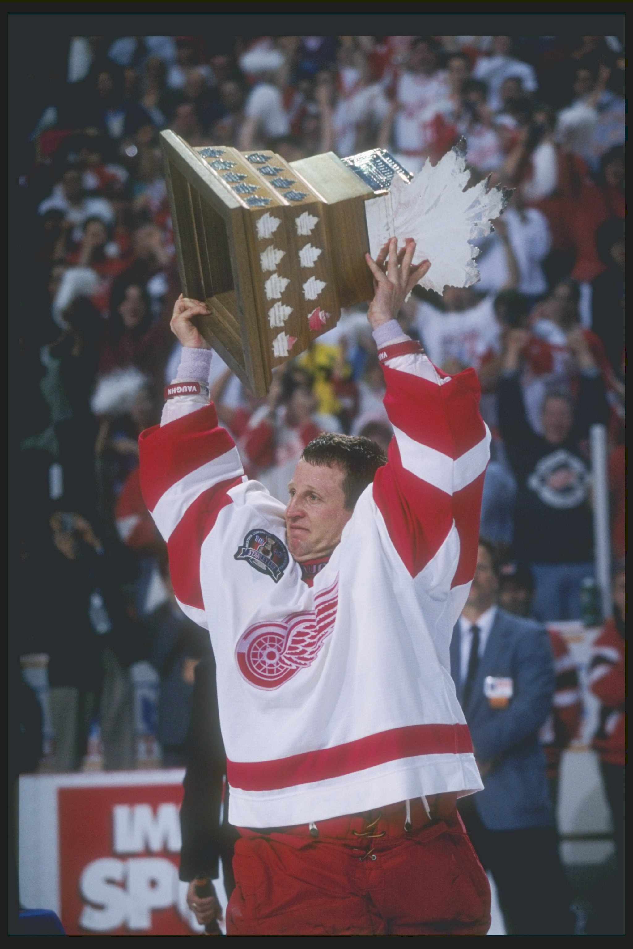 7 Jun 1997:  Goaltender Mike Vernon of the Detroit Red Wings celebrates with the MVP Trophy after a playoff game against the Philadelphia Flyers at Joe Louis Arena in Detroit, Michigan.  The Red Wings won the game, 2-1. Mandatory Credit: Rick Stewart  /Al