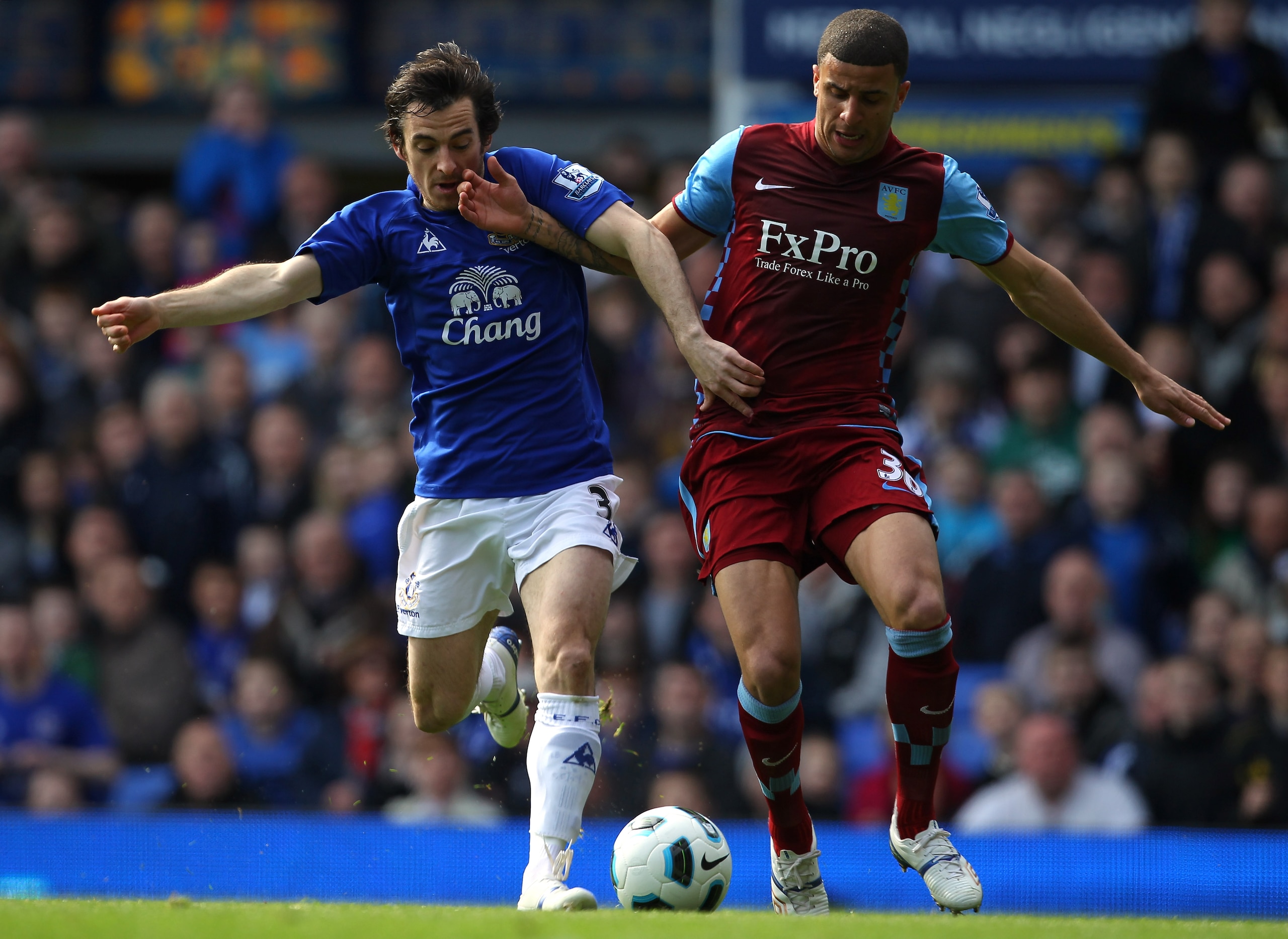 LIVERPOOL, ENGLAND - APRIL 02:  Leighton Baines of Everton challenges Kyle Walker of Aston Villa for the ball during the Barclays Premier League match between Everton and Aston Villa at Goodison Park on April 2, 2011 in Liverpool, England.  (Photo by Alex